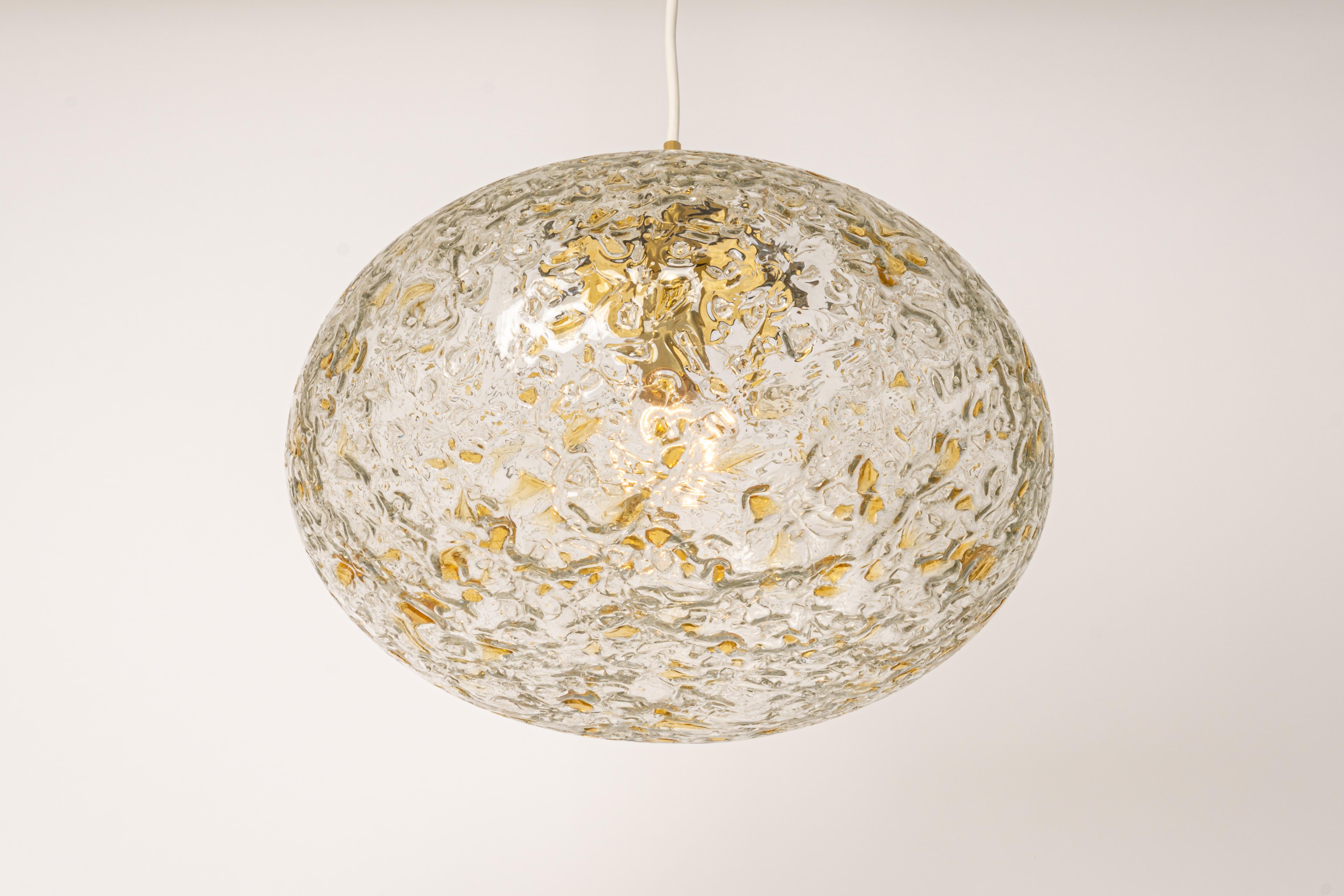 Doria ceiling light with large volcanic murano glass ball.
High quality of materials, gives a wonderful light effect when it is on.
Very good condition. Cleaned, well-wired and ready to use. 
The fixture requires one standard bulb (E-27)
Light