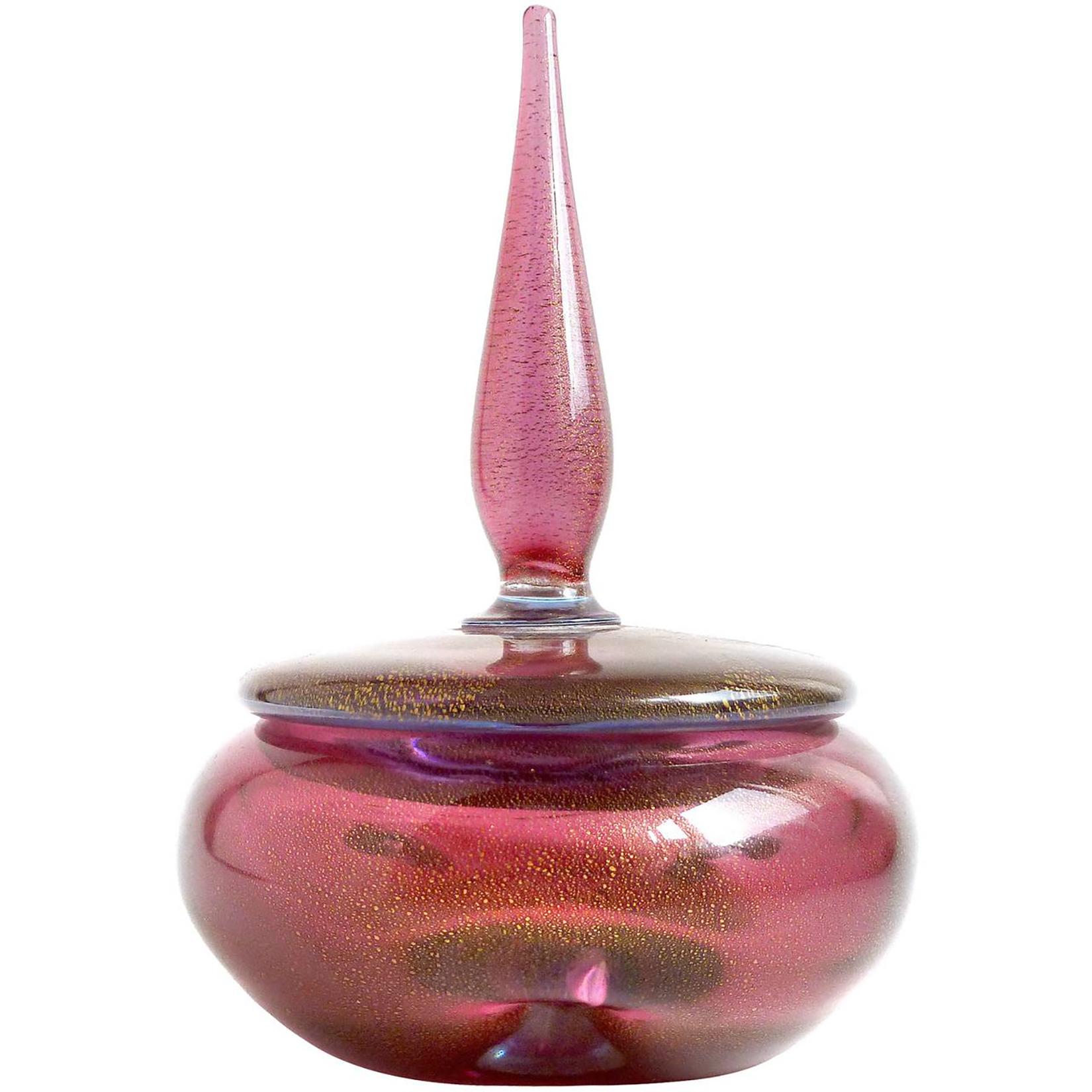 Gorgeous and elegant, vintage Murano hand blown amethyst and gold flecks Italian art glass powder or jewelry box and perfume bottles set. The set is documented to designer Alfredo Barbini, circa 1950s, and published in his Weil Ceramics and Glass