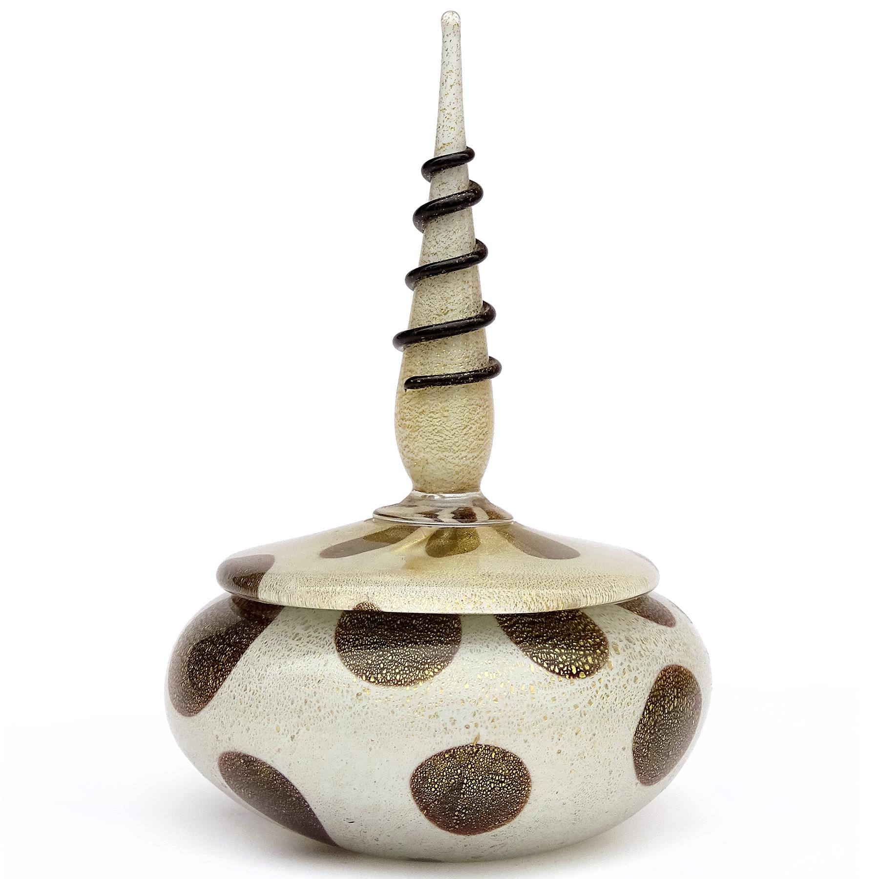 Beautiful vintage Murano hand blown white, dark purple / black and gold flecks Italian art glass vanity powder or jewelry box. Documented to designer Alfredo Barbini, circa 1950s. The lidded jar has a spike top as a handle, decorated with a black