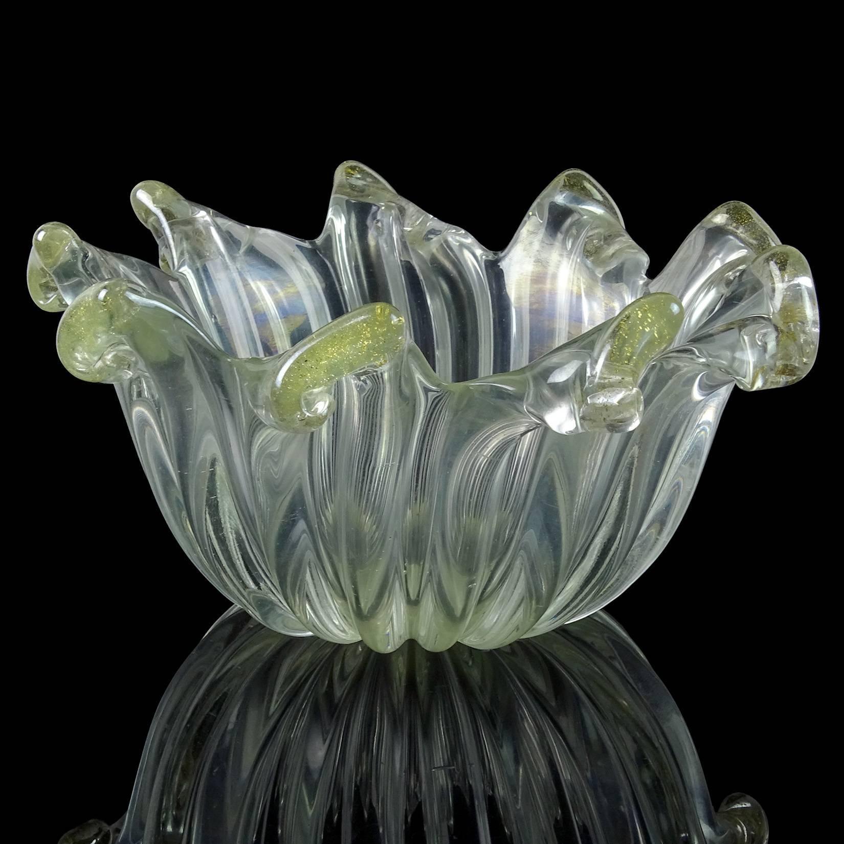 Beautiful and unusual, vintage Murano hand blown slight iridescent surface with gold flecks accents Italian art glass decorative bowl. The piece is attributed to designer Ercole Barovier, for the Barovier e Toso company, circa 1940s. The bowl has a