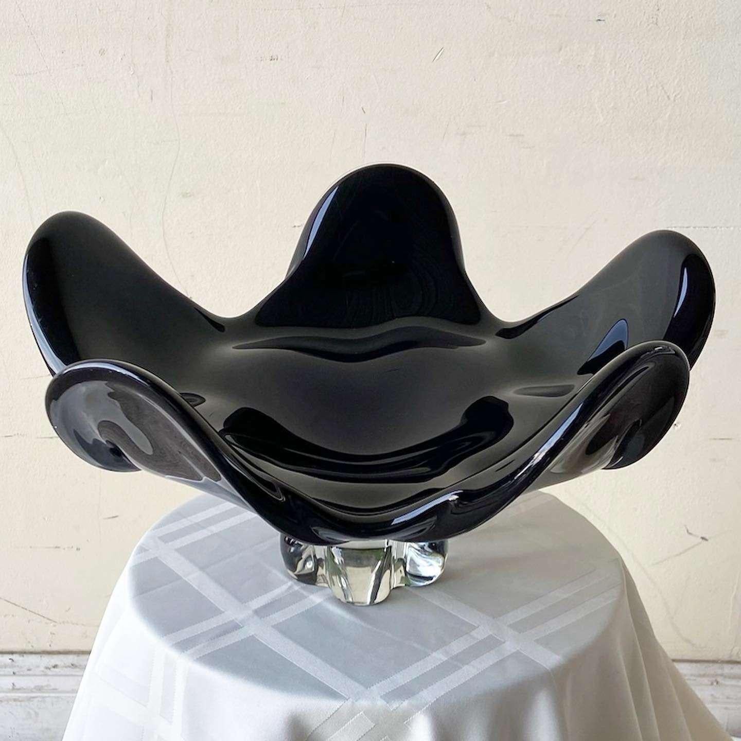 Incredible large sculptural Italian Murano glass bowl by Seguso for Oggetti. Features a black amethyst glass with a clear base in the shape of an open flower.
