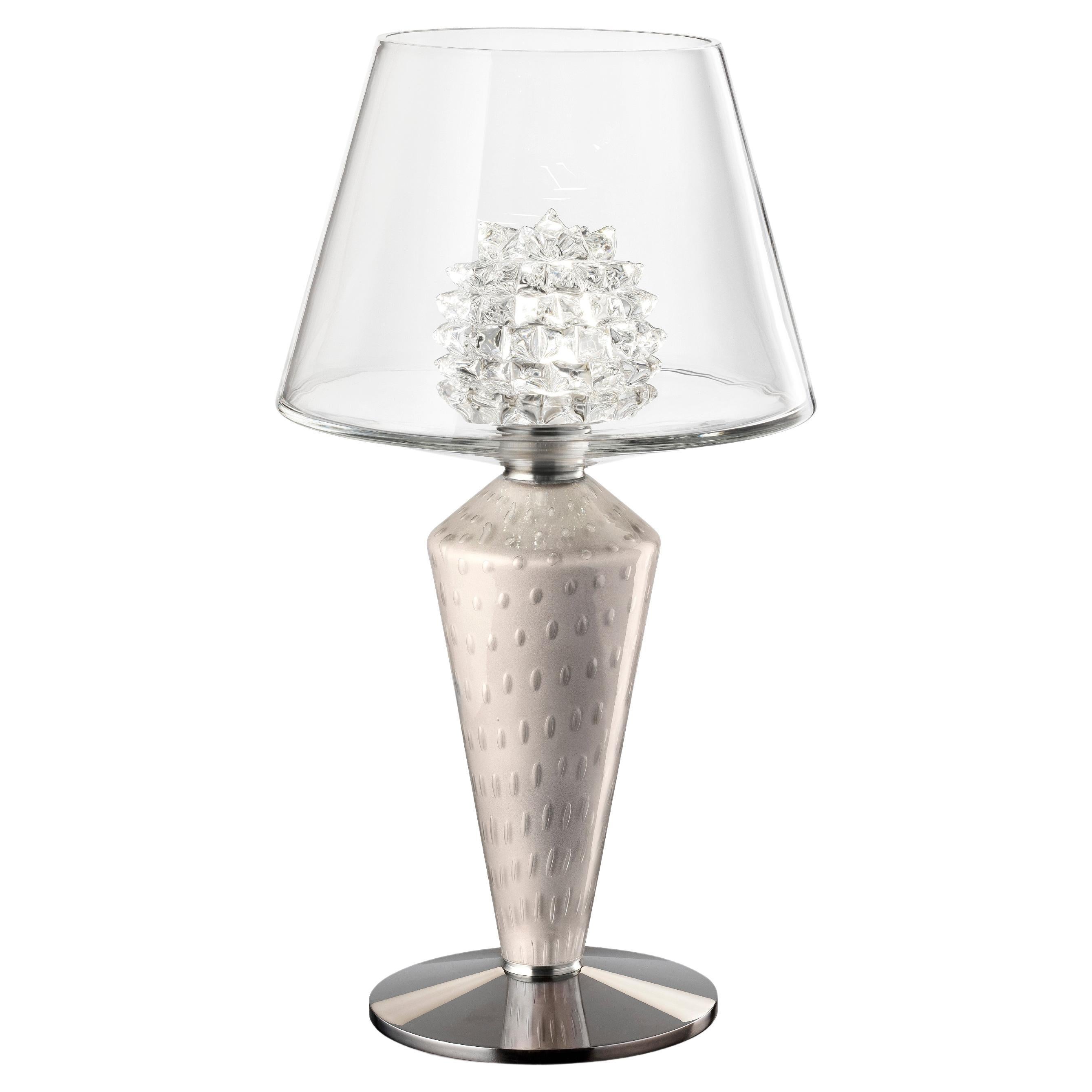 Proud and elegant as a princess of eternal beauty, the Grace collection is permeated
by genteel classic charm. The structure is eclectic, borrowing the diffuser system
from the traditional Murano chandelier: the cup grows in size and becomes a