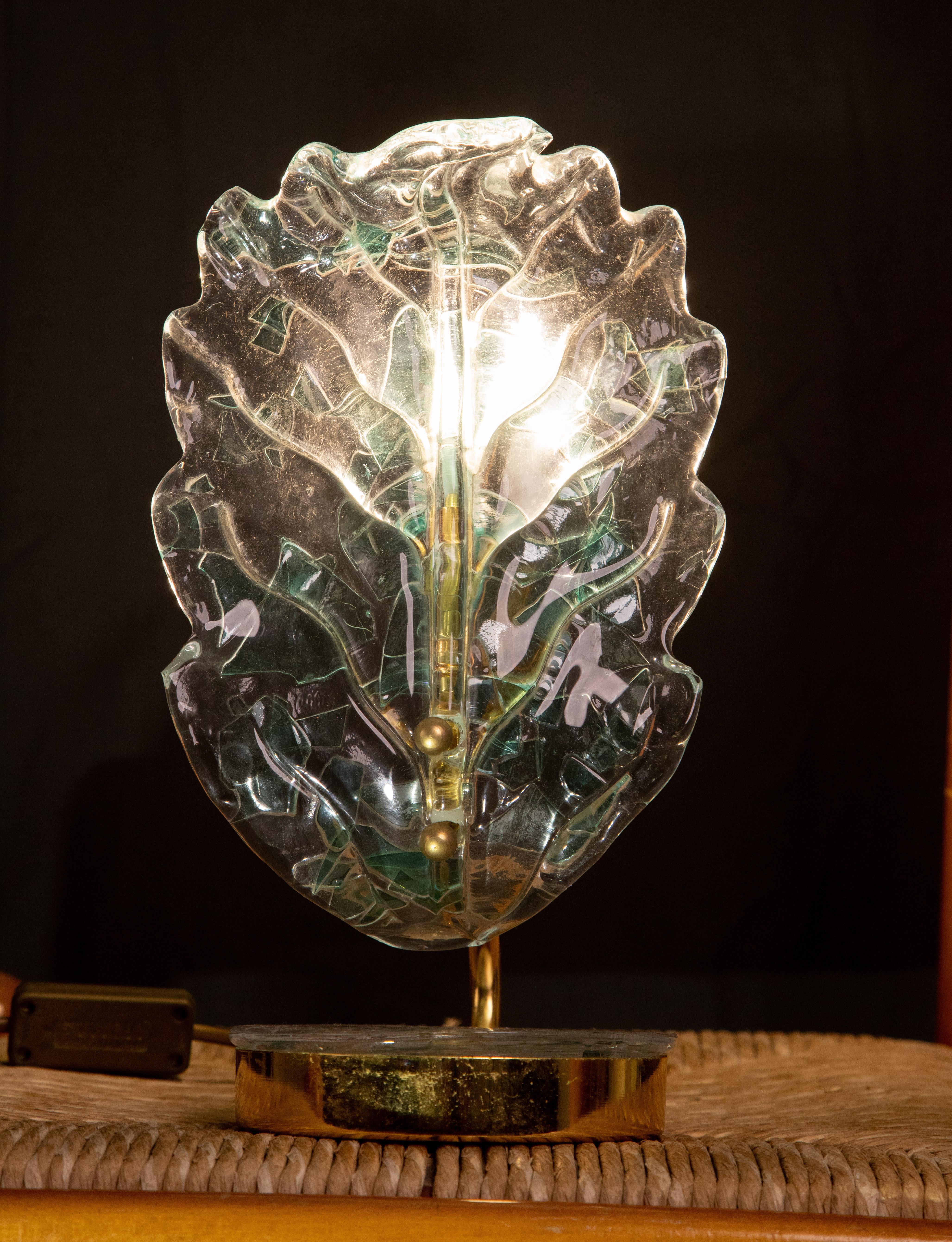 Beautiful Murano glass table lamp in blue color with transparent shades.
Also works with LED bulbs. 
Exquisite details of the Murano glass shade with iridescent colors.
Due to the workmanship of the glass, the light spreads softly and diffusely.