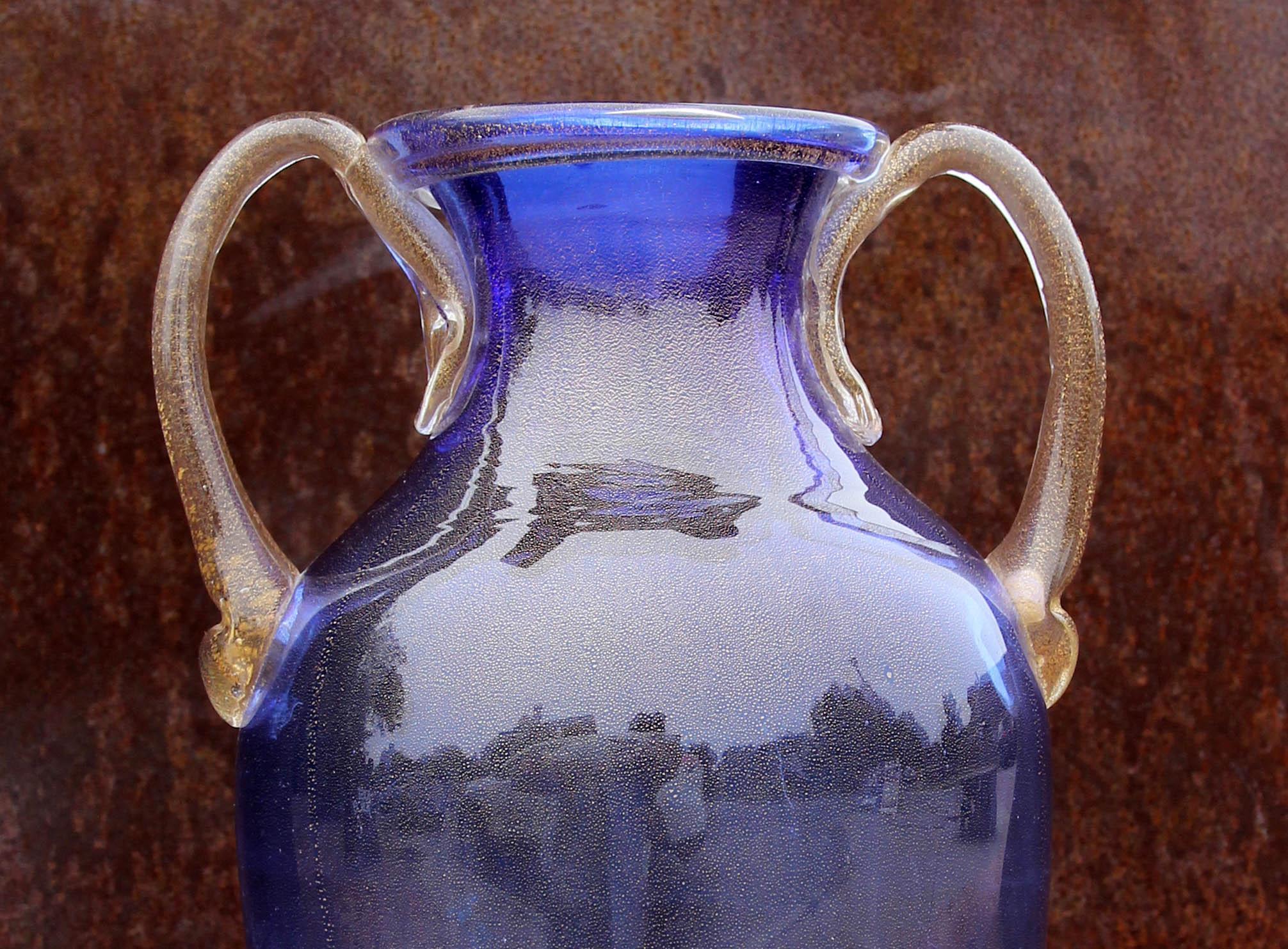 Murano blue glass two handle vase decorated with gold fleck interior. Amphora form.