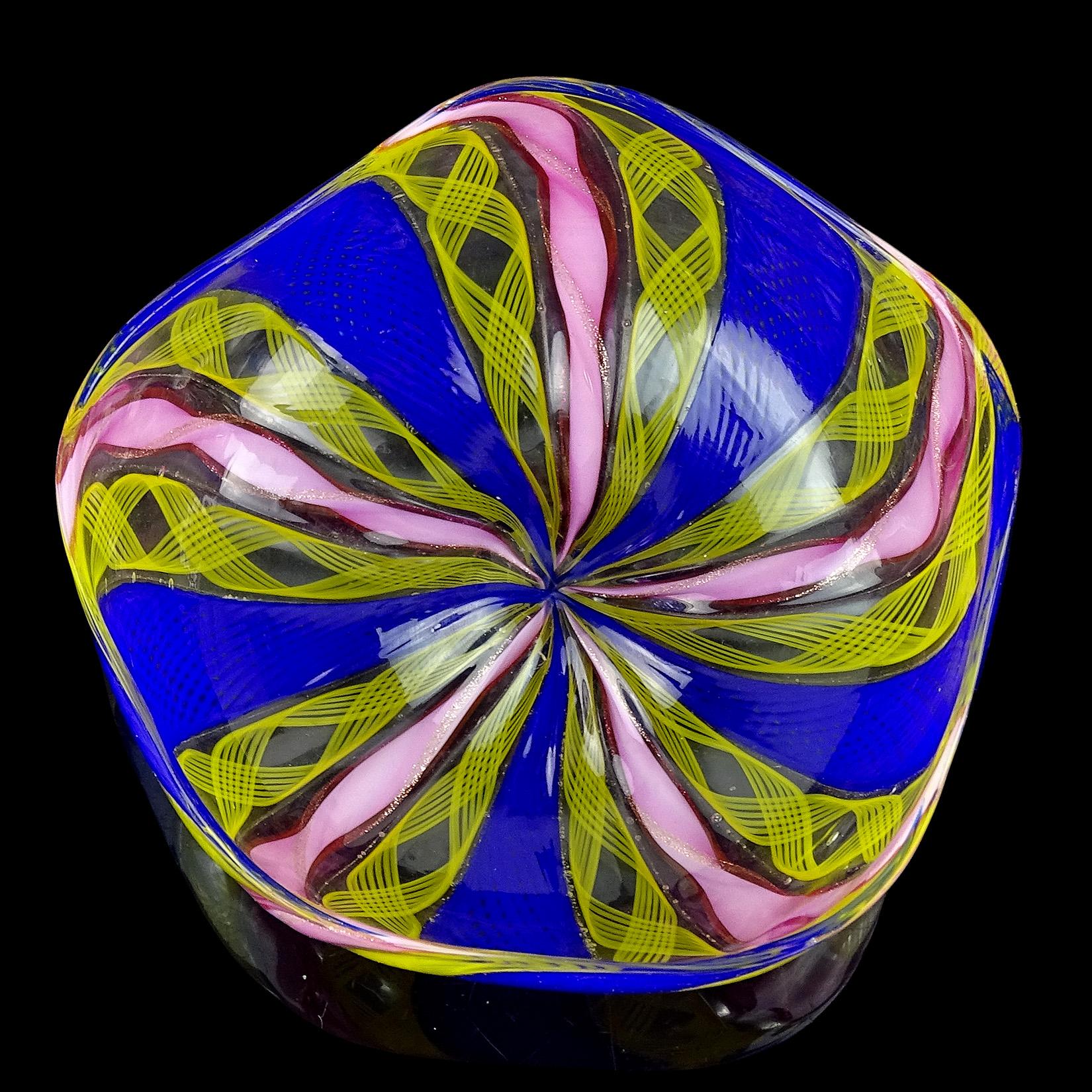 Beautiful vintage Murano hand blown cobalt blue, bright yellow and pink ribbons Italian art glass sand dollar / star shaped trinket dish. Created in the manner of the Fratelli Toso and Salviati companies. The pink ribbons have a twisting copper