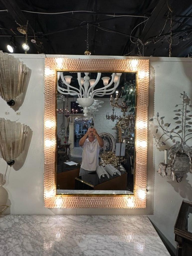 Fabulous Modern Murano blush glass and brass light up mirrors. These are sure to make a statement!