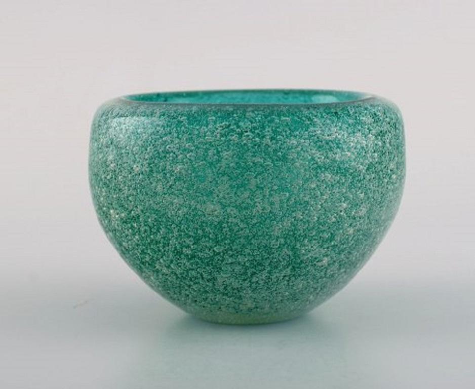 Murano bowl in turquoise mouth-blown art glass with inlaid bubbles. Italian design, 1960s.
Measures: 10 x 7.2 cm.
In perfect condition.