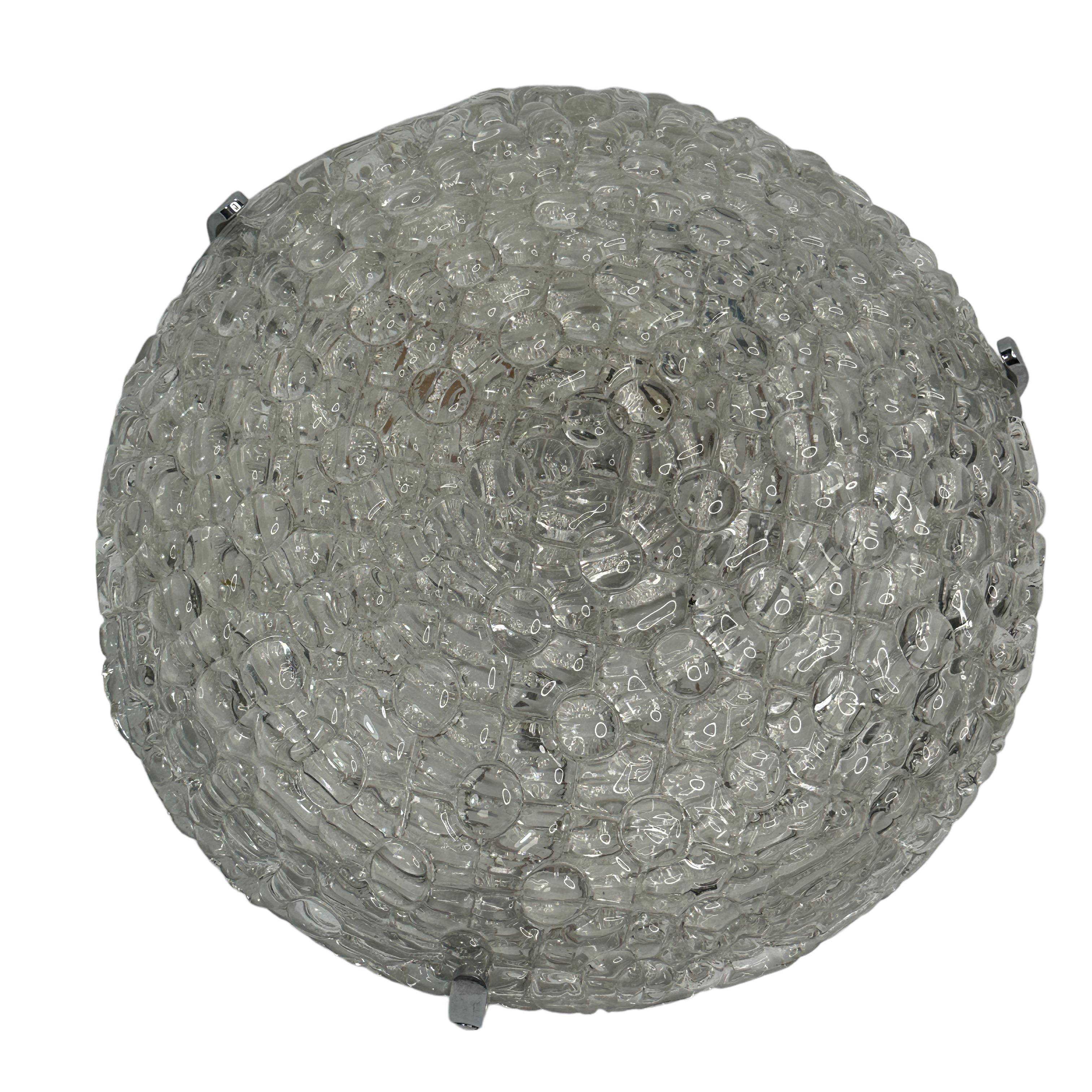 A gorgeous flush mount by Hustadt Leuchten Germany. Heavy thick murano glass on a metal fixture. The Fixture requires one European E14 / 110 Volt Candelabra bulb, up to 40 watts. A nice addition to any room. Found at an estate sale in Nuremberg,