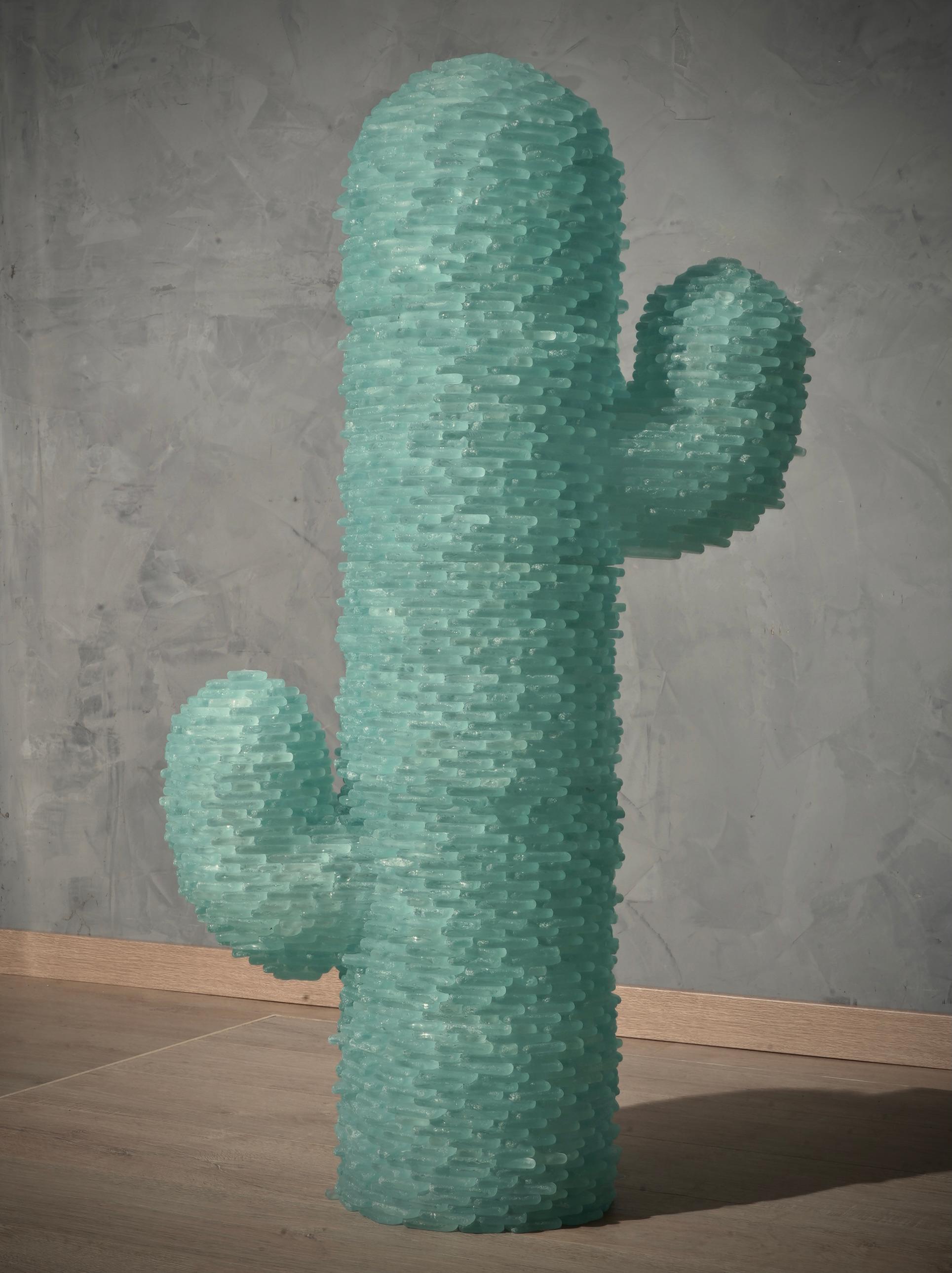 Splendid illuminated sculpture entirely in very fine Murano glass plates of a splendid sea water green color.

More than a floor lamp, it is a cactus sculpture made up of small pieces of sea-green colored Murano glass. It is made up of a series of