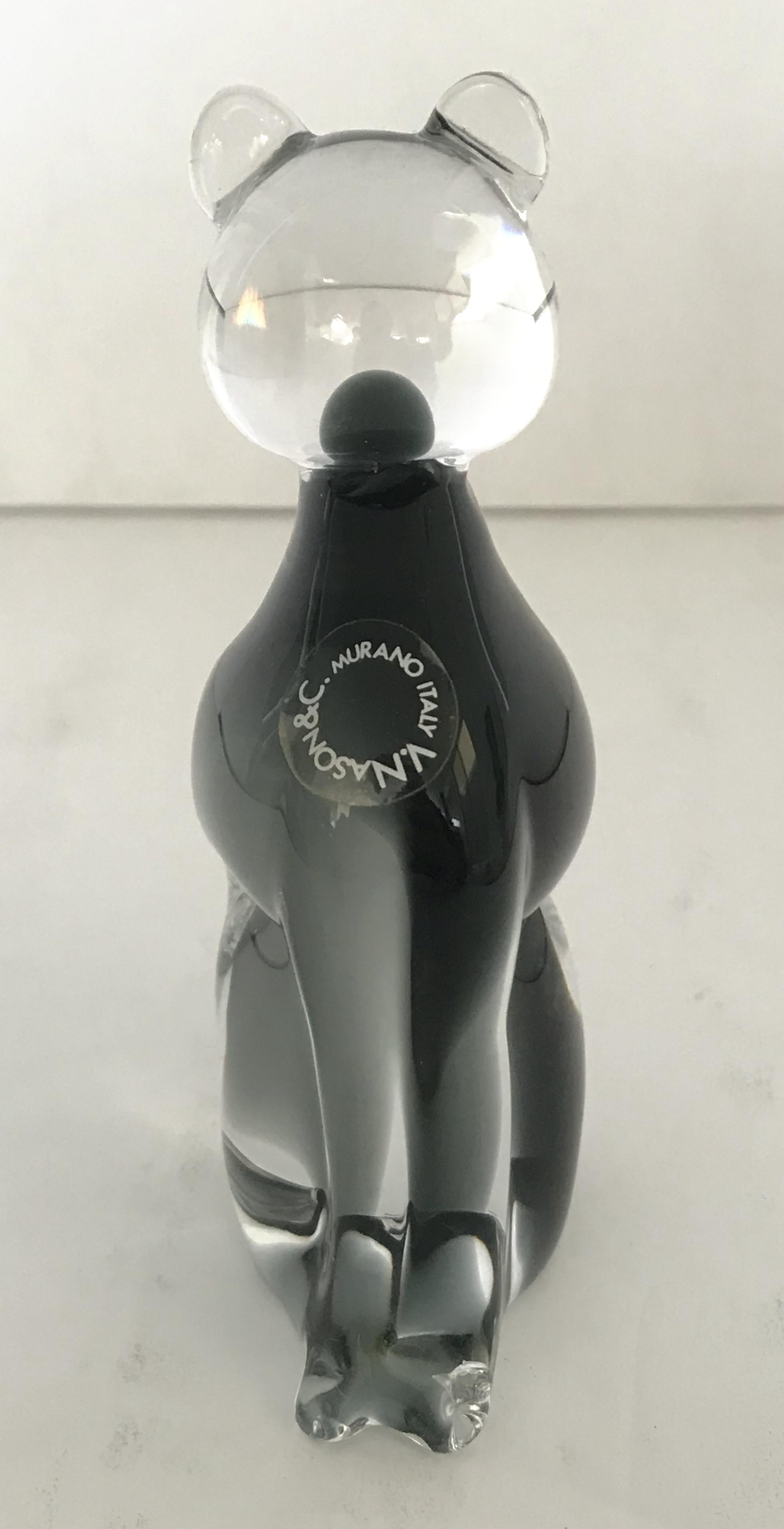 Vintage hand blown Murano glass cat sculpture with beautiful smoky gray gradient / Made in Italy by V. Nason & Co, circa 1970s
Original sticker on the body
Measures: height 5.5 inches, width 2.5 inches, depth 1.5 inches
1 in stock in Palm Springs ON