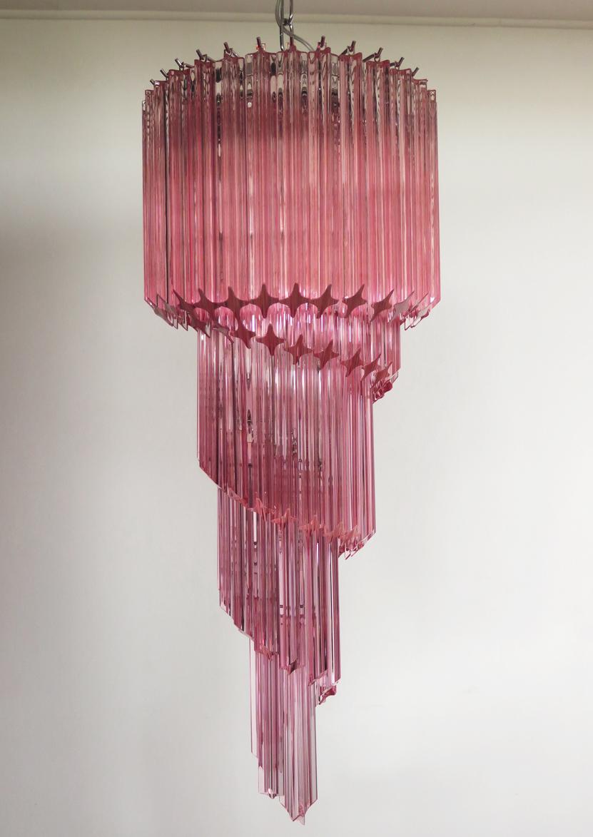 Fantastic vintage Murano chandelier made by 86 Murano crystal pink prism in a nickel metal frame. The shape of this chandelier is spiral.
Period: late 20th century
Dimensions: 63 inches height (160 cm) with chain; 39.40 inches height (100 cm)