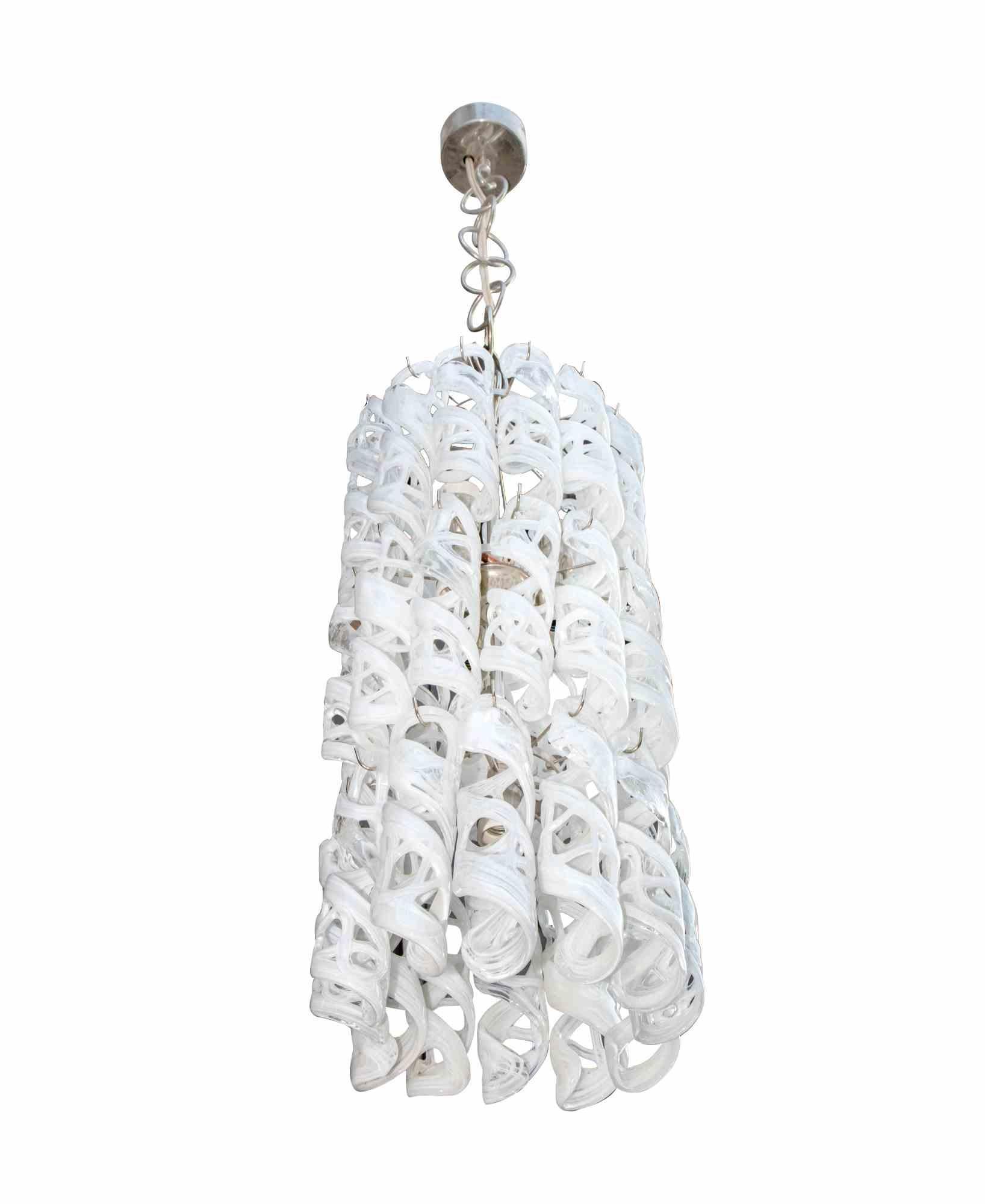 Venini Murano Chandelier is a vintage lamp realized in the 1960s by Venini. 

Cascade Hand Blown Murano Glass Chandelier.

Height without cable: 65  cm

Venini was educated to be a lawyer, his family had been in the glassmaking business in Italy