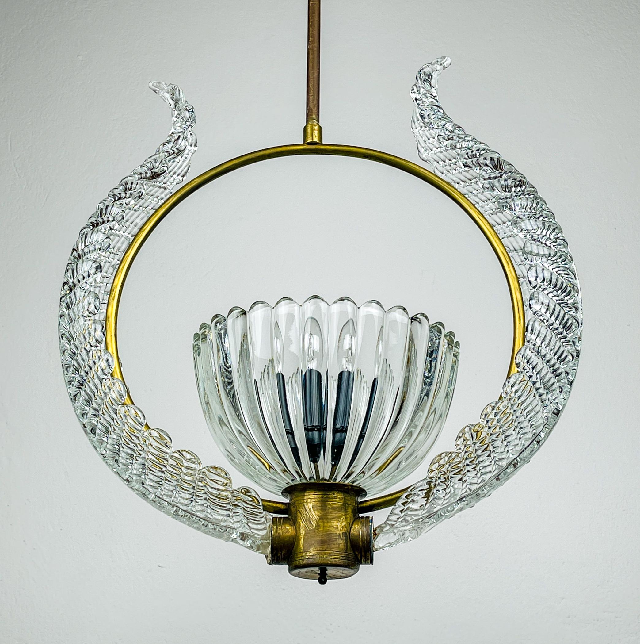 Murano chandelier by Ercole Barovier Barovier & Toso made in Italy in the 1950s.
Founded in 1295 in Murano, Italy, Barovier & Toso stands as one of the oldest family businesses globally. Originally established as Barrovier, the company later merged
