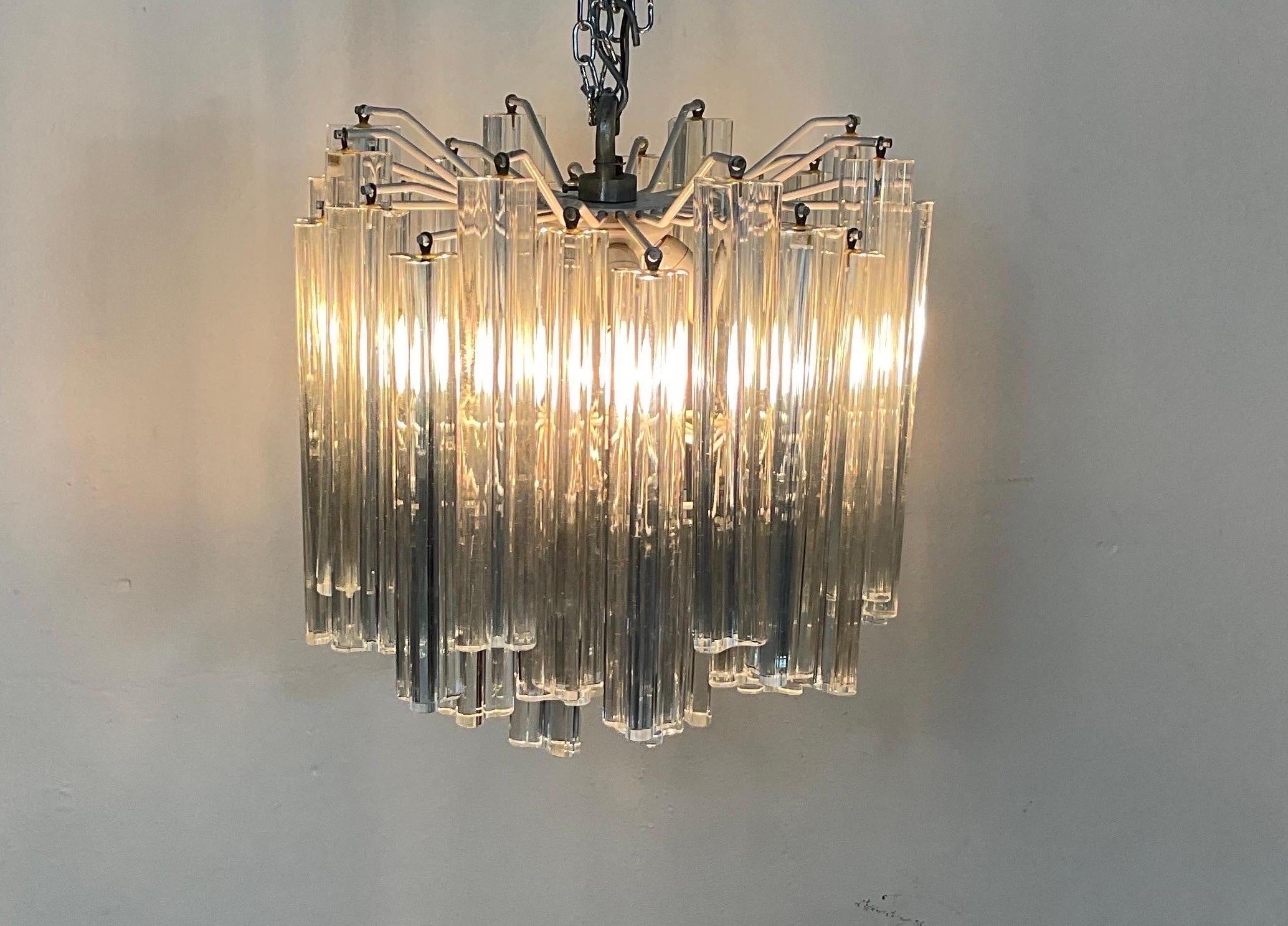 Fantastic Murano glass chandelier and a brass structure. Chandelier in good condition and complete. Attributable to the famous Italian designer Paolo Venini.