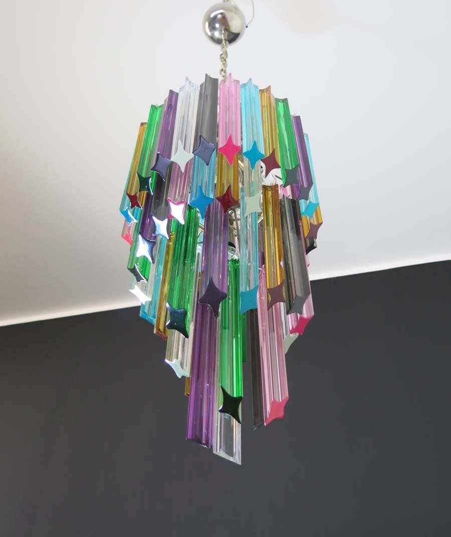 Fantastic vintage Murano chandelier made by 54 Murano crystal multicolored prism in a nickel metal frame. The shape of this chandelier is spiral.
Period: late 20th century
Dimensions: 61 inches height (155 cm) with chain; 33.50 inches height (85