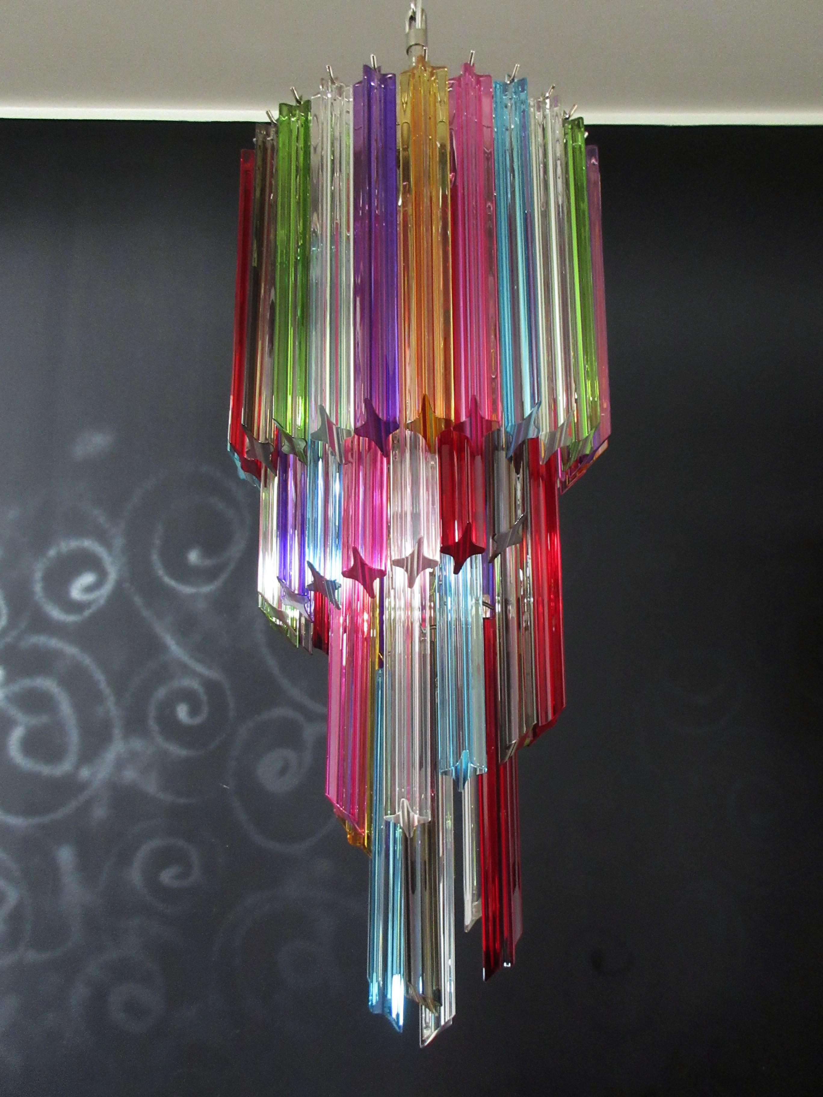 Fantastic vintage Murano chandelier made by 54 Murano crystal multicolored prism in a nickel metal frame. The shape of this chandelier is spiral.
Period: late 20th century
Dimensions: 61 inches height (155 cm) with chain; 33.50 inches height (85