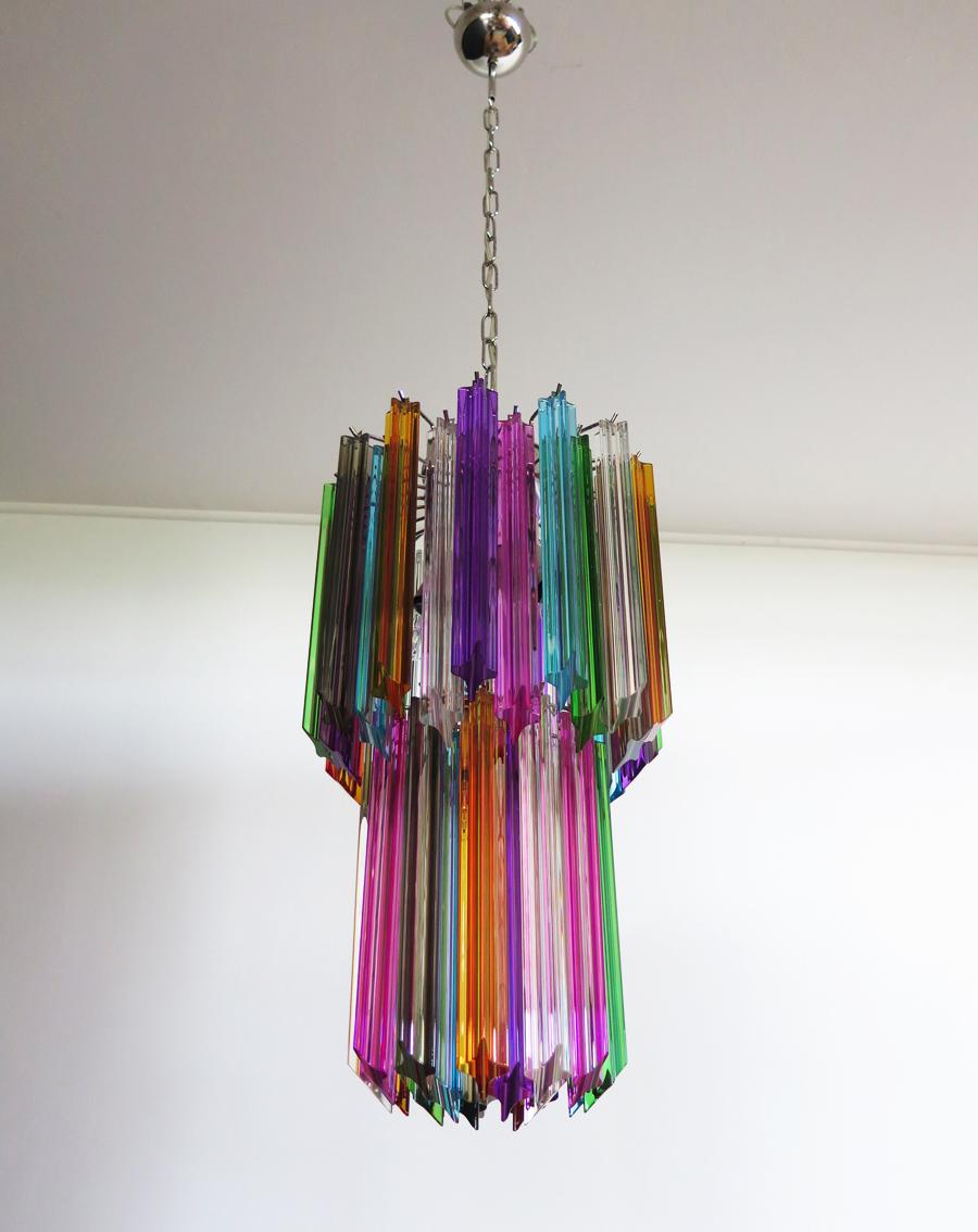 Fantastic vintage Murano chandelier made by 46 Murano crystal multicolored prism in a nickel metal frame.
Period:  late XX century
Dimensions:  55,10 inches height (140 cm) with chain; 27,50 inches height (70 cm) without chain; 12,6 inches diameter