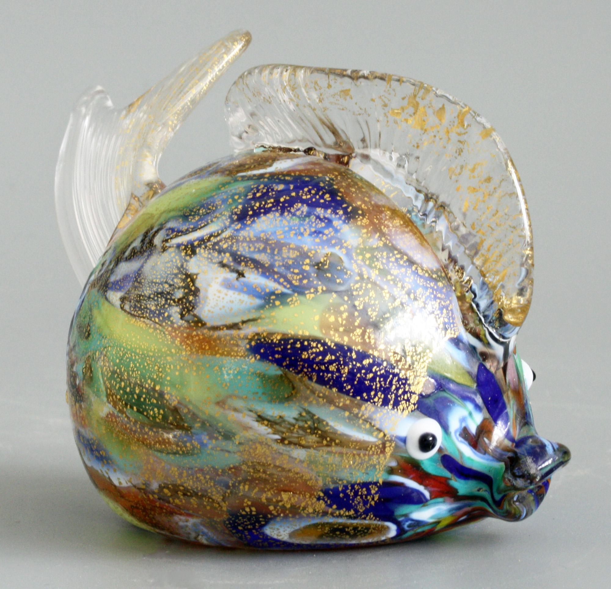 A delightful and quality vintage Italian Murano hand blown glass puffer fish dating from the 20th century. The rounded fish is blown in clear glass with multi colored and gold aventurine inclusions to the body and with black on white glass applied