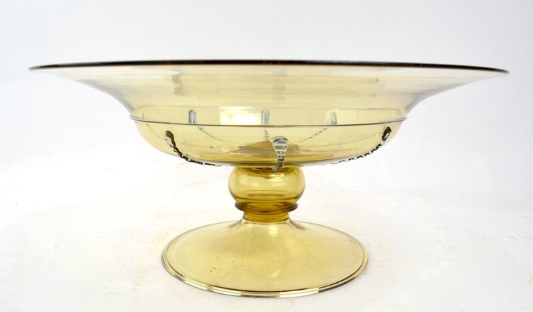 Rare centrepiece bowl attributed to Martinuzzi for Cappellin (precursor to Venini) in the Soffiati technique. This example is in perfect condition, free of damage, chips, scratches, repairs or loss, it is unsigned. The bowl is tea colored with