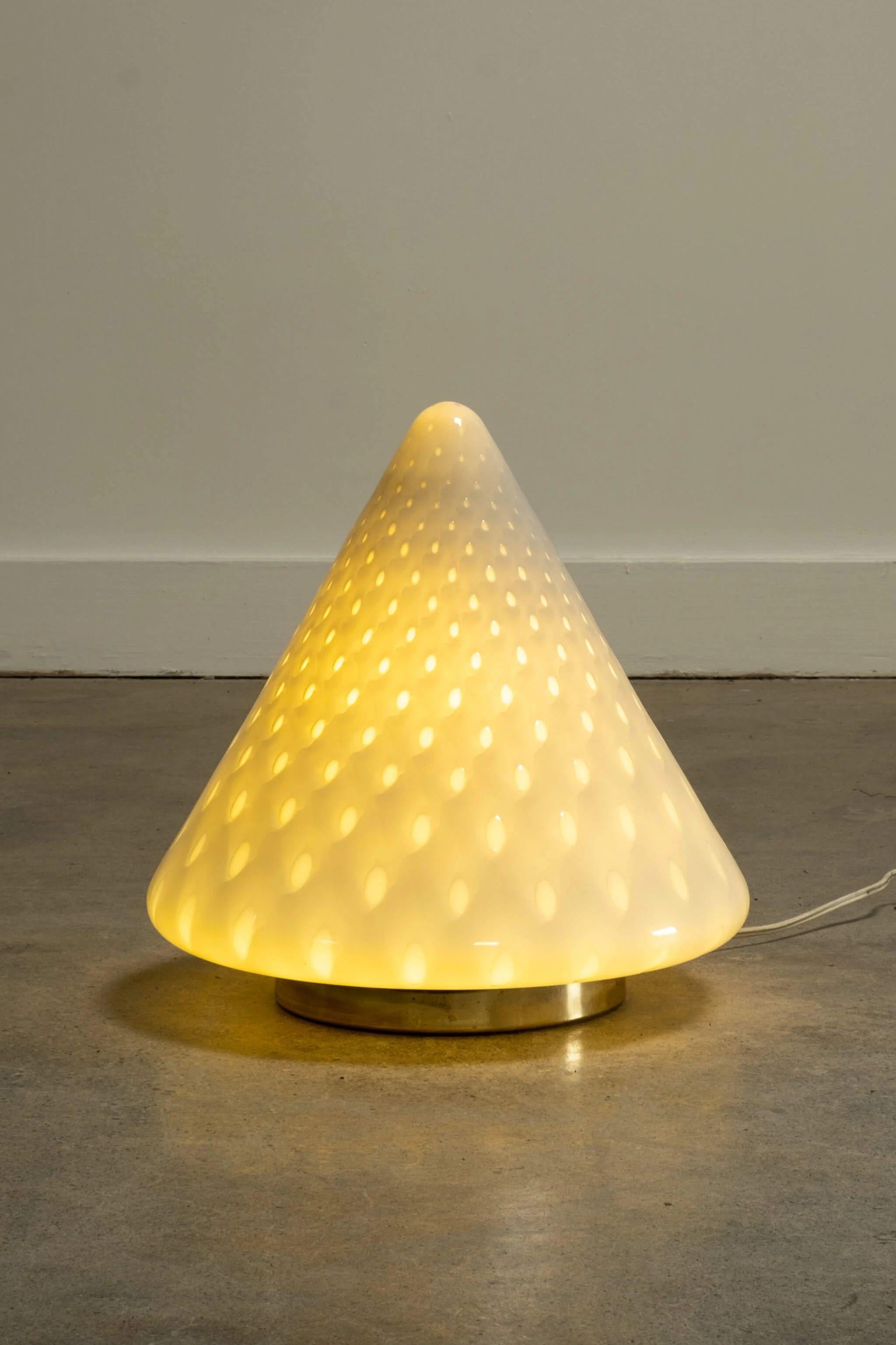 Soft light is diffused through the cone-shaped Murano glass. A statement geometric table lamp.