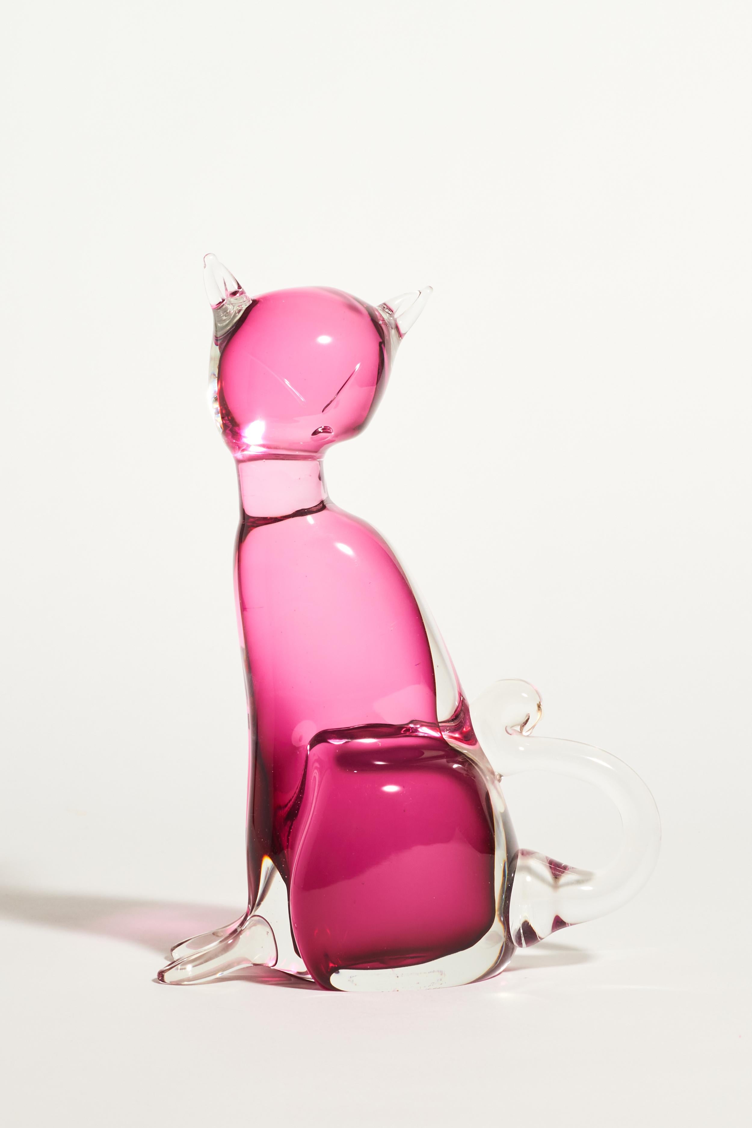 Murano layered glass cat with expressive face details and gorgeous cranberry pink inner layer.