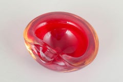 Murano. Decorative bowl with organic form in red sommerso glass. 1960s/70s