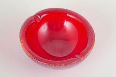 Murano. Decorative bowl with organic form in red sommerso glass. 1960s/70s