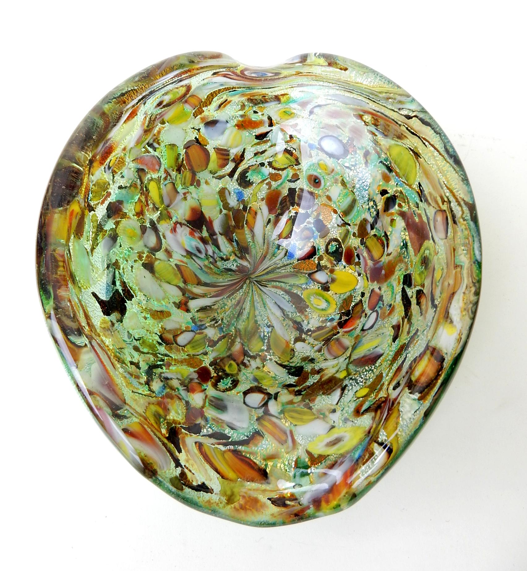 Dino Martens for Aureliano Toso art glass bowl from Murano Italy, circa 1950s.
Multi-color murrine with emerald green sides.
Lovely piece in excellent condition.