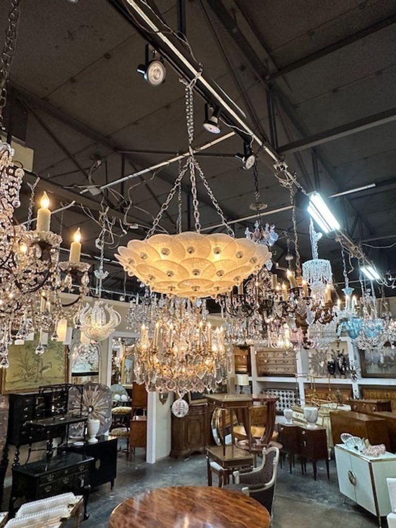 Modern Murano frost disc glass fluish mount chandelier. Perfect for today's transitional designs!