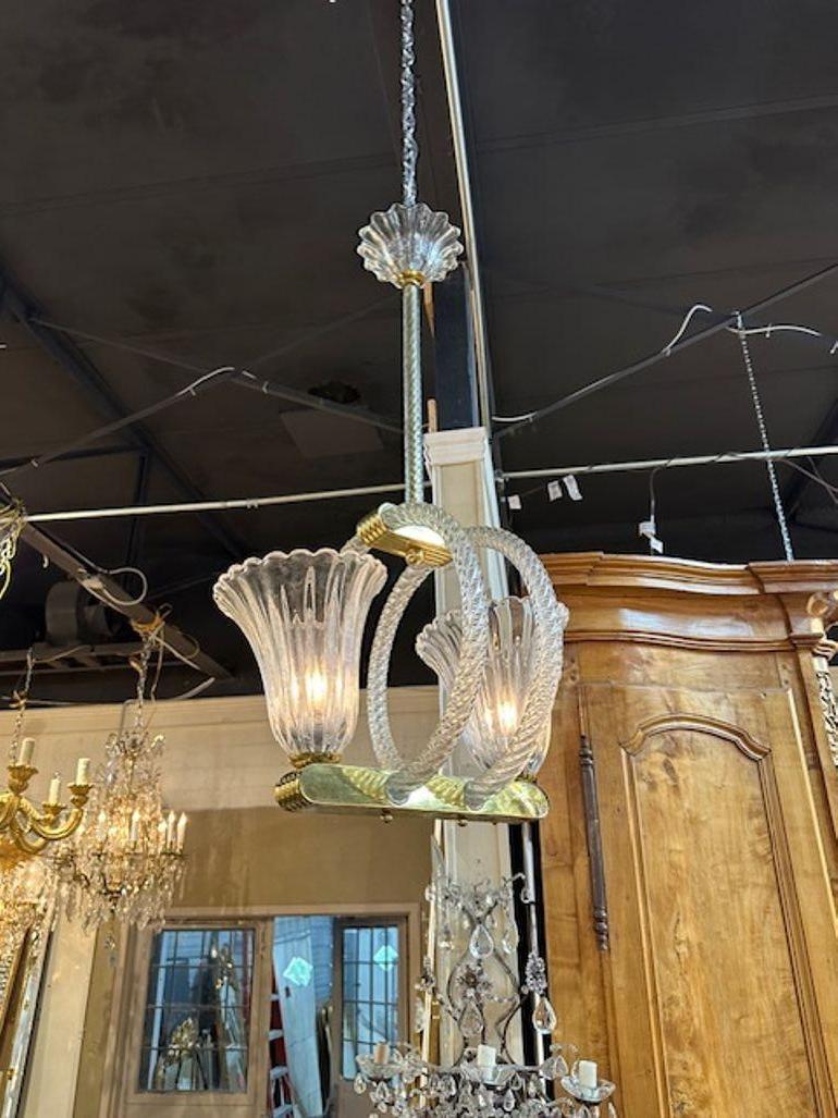 Vintage Italian Murano glass and brass double cup chandelier after Barovier. Cira 1970. The chandelier has been professionally rewired, comes with matching chain and canopy. It is ready to hang!