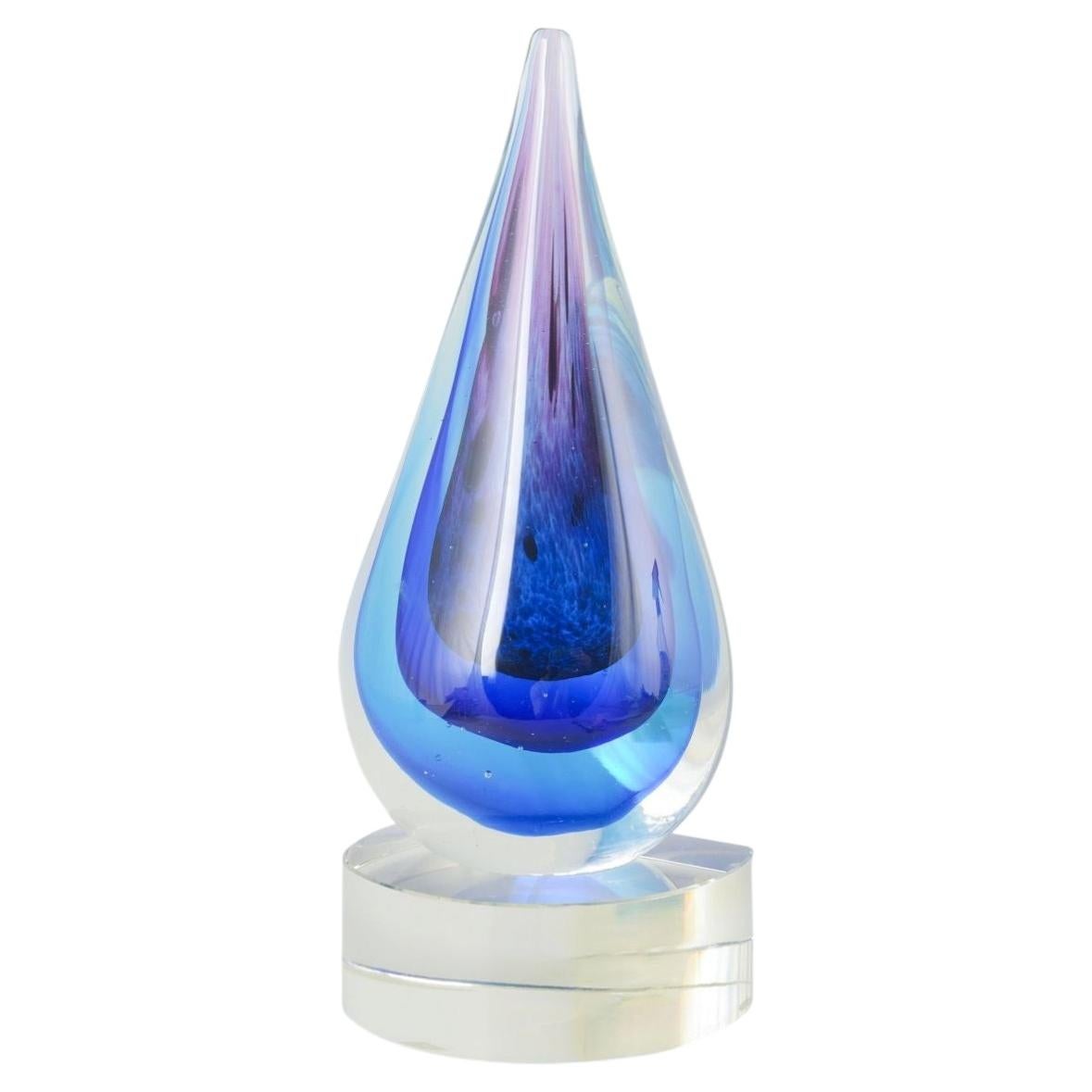 Murano drop-shaped sculpture in clear and blue-violet art glass. 1970s. For Sale