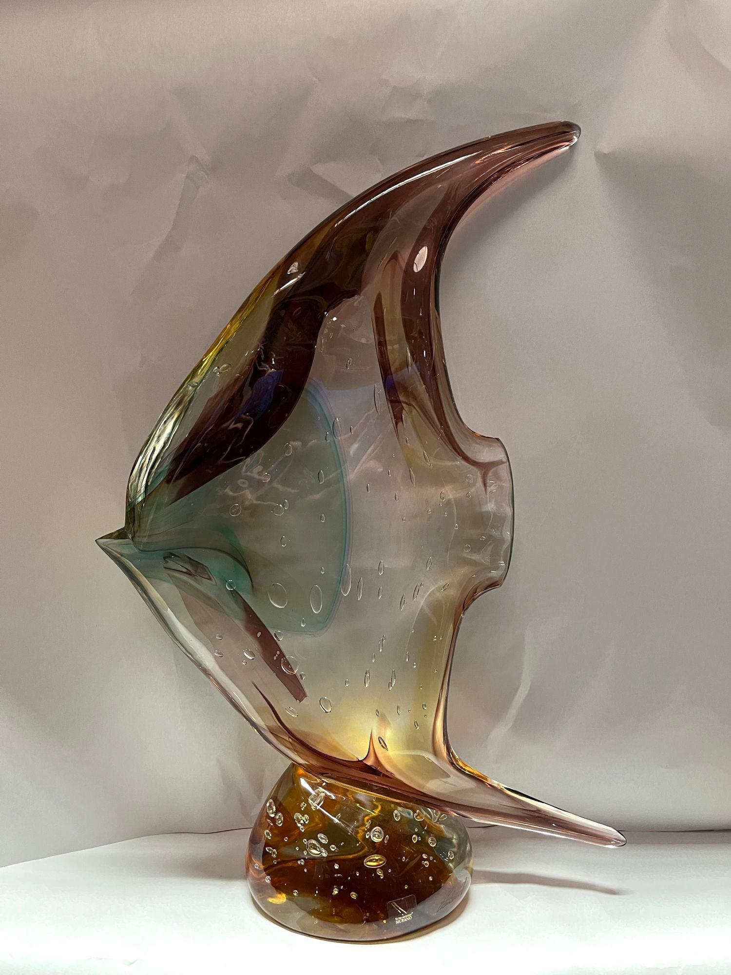Murano glass fish sculpture by Sergio Costantini for Vetro Artistico Murano with brown, amber, yellow and blue tones. Made in Italy, 20th century (Includes sticker and signature)
Dimensions:
20