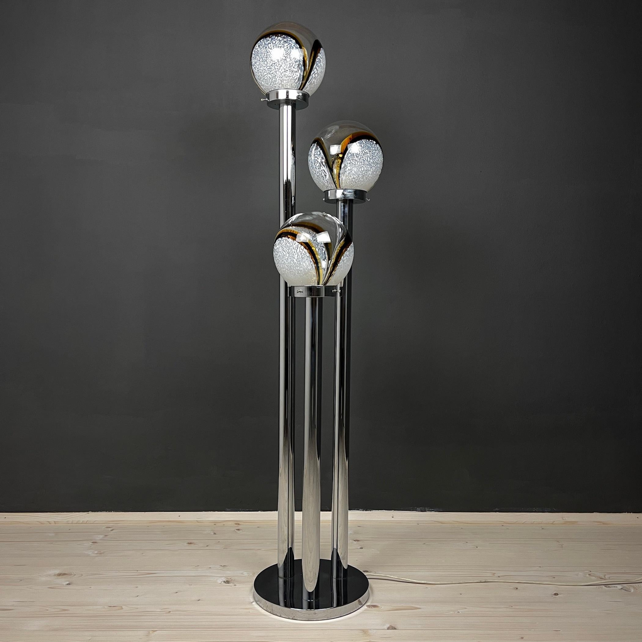 Italian-made in the 1970s midcentury AV Mazzega floor lamp made of Murano glass. In 1946, Angelo Vittorio Mazzega formed AV Mazzega. Over the years, Mazzega has collaborated with other highly regarded designers from around the world, including De
