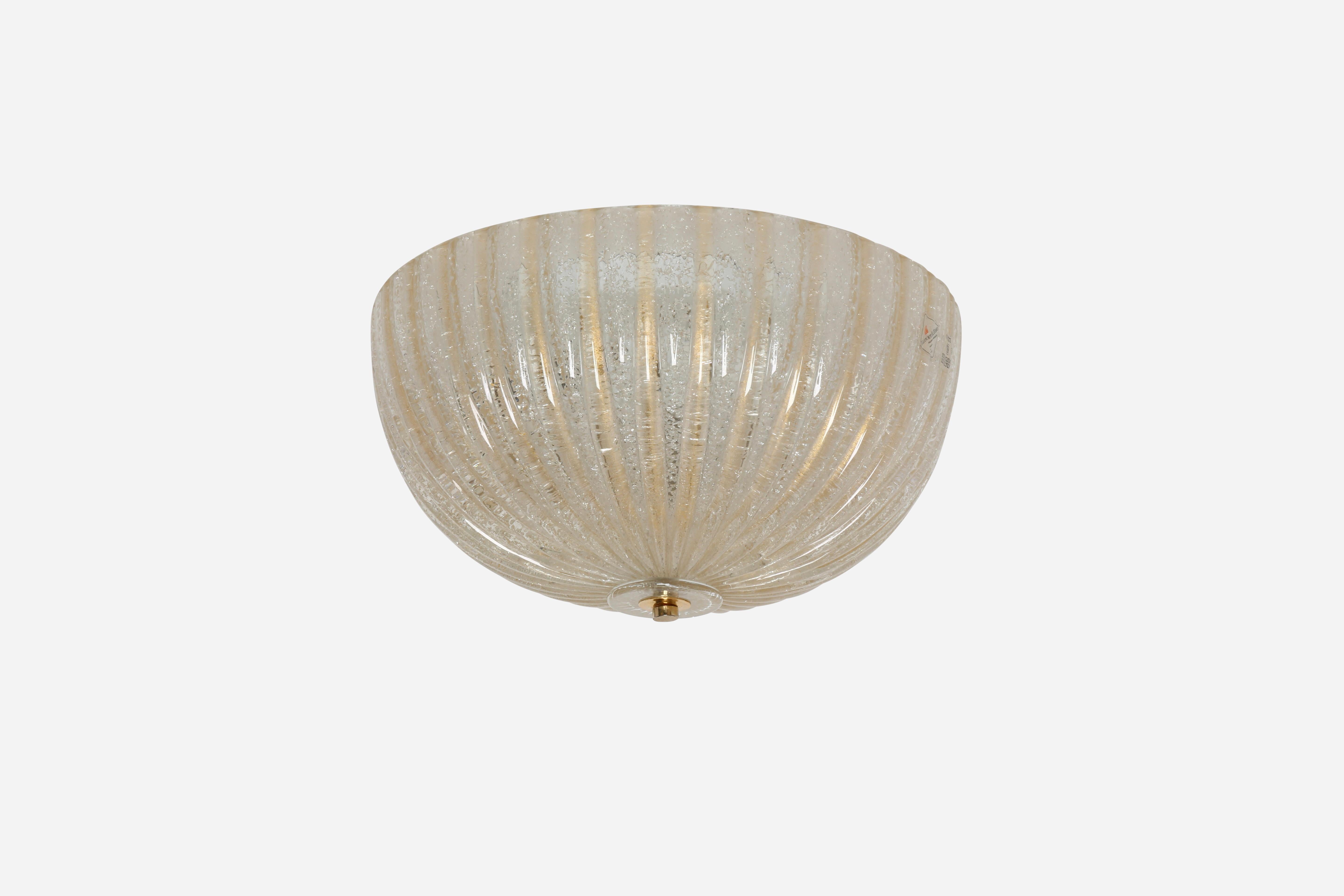 Murano glass flush mount ceiling light by Barovier & Toso.
Designed and made in Italy in 1970s.
Hand blown Murano glass with gold leaf inclusions.
Labeled with sticker.
Three candelabra bulbs. 
Complimentary US rewiring upon request.