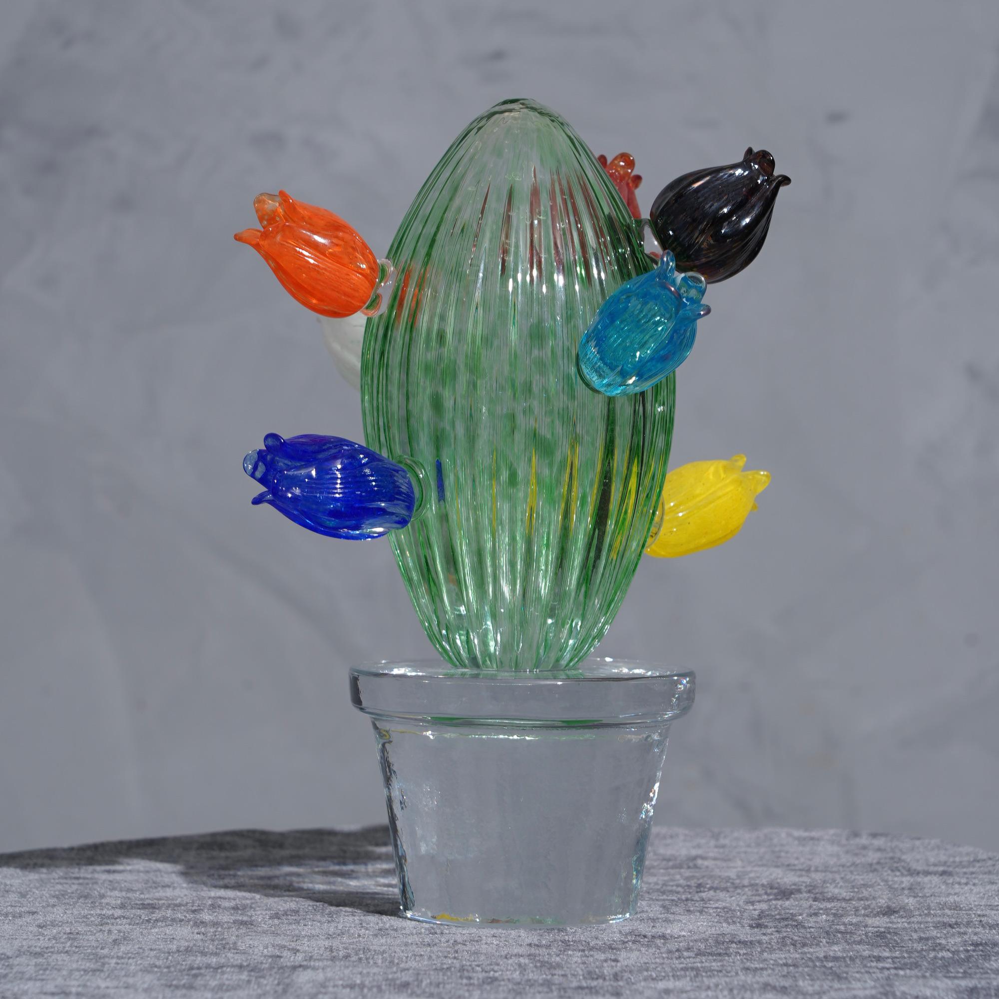 Italian design by Marta Marzotto creator of style, this cactus is a fashion icon of the Italian style, emerald green with a beautiful clear glass vase underneath.

In limited edition, as can be seen from the writing under the transparent vase