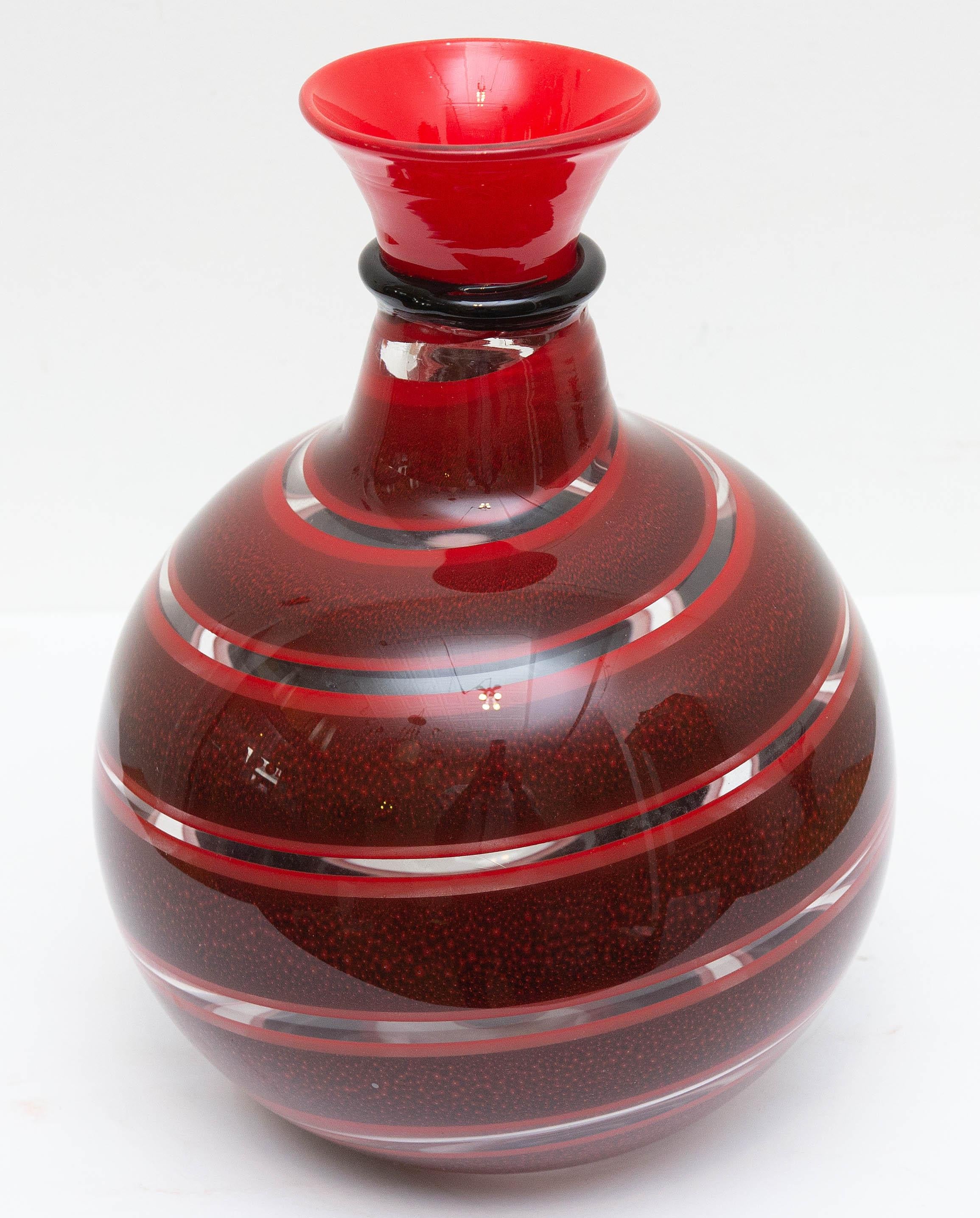 Murano garnet red and clear swirl vase. Hand blown with ground pontil, circa 1980s.