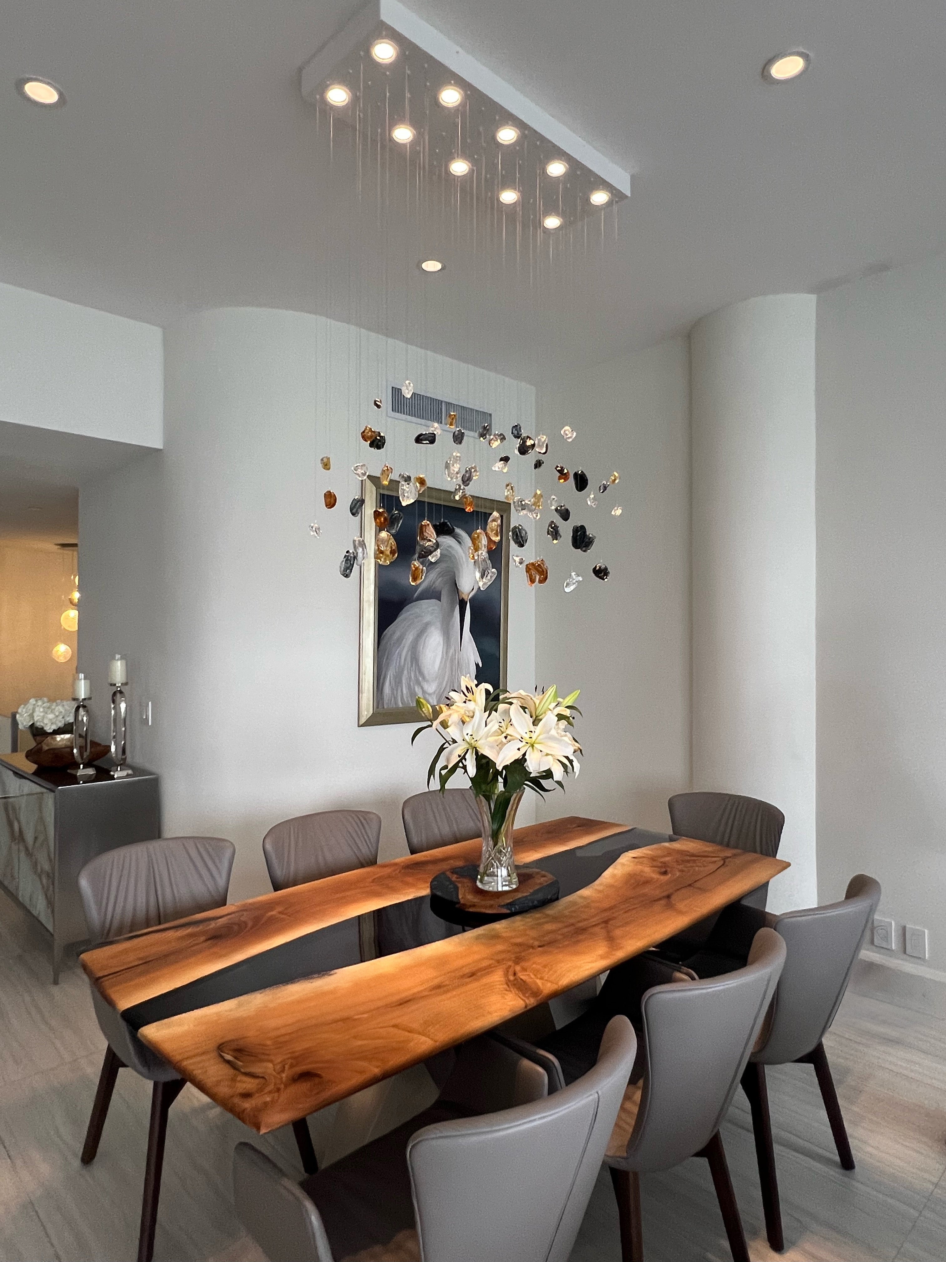 Murano Gemstones Chandelier

Elevate your home decor with the Murano Gemstones Glass Chandelier, a stunning centerpiece that blends modern design with organic elegance. Each pendant in this exquisite chandelier is meticulously crafted to resemble