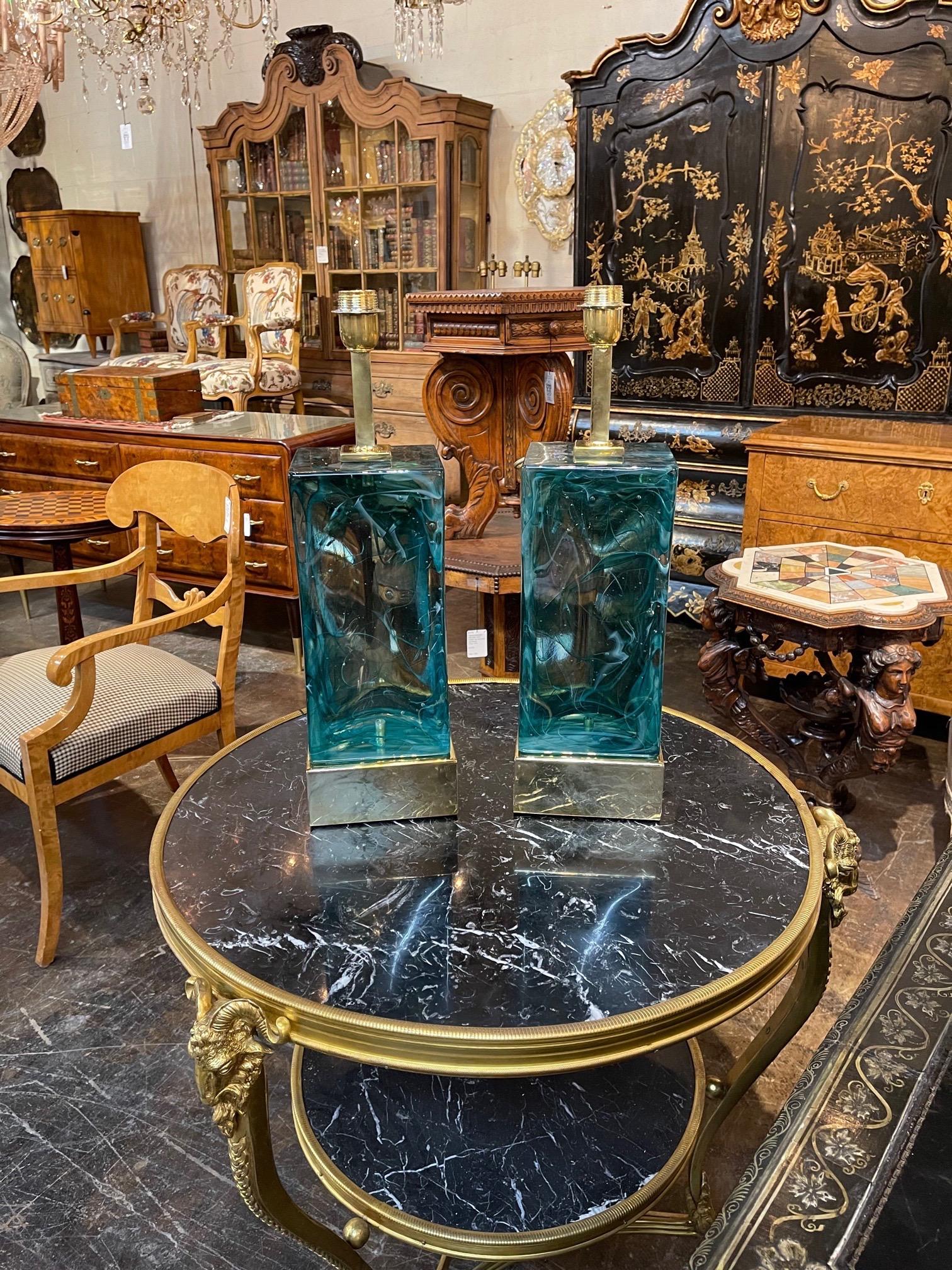 Very fine pair of turquoise colored Murano glass and brass lamps. Beautiful color and depth to this glass. So pretty!