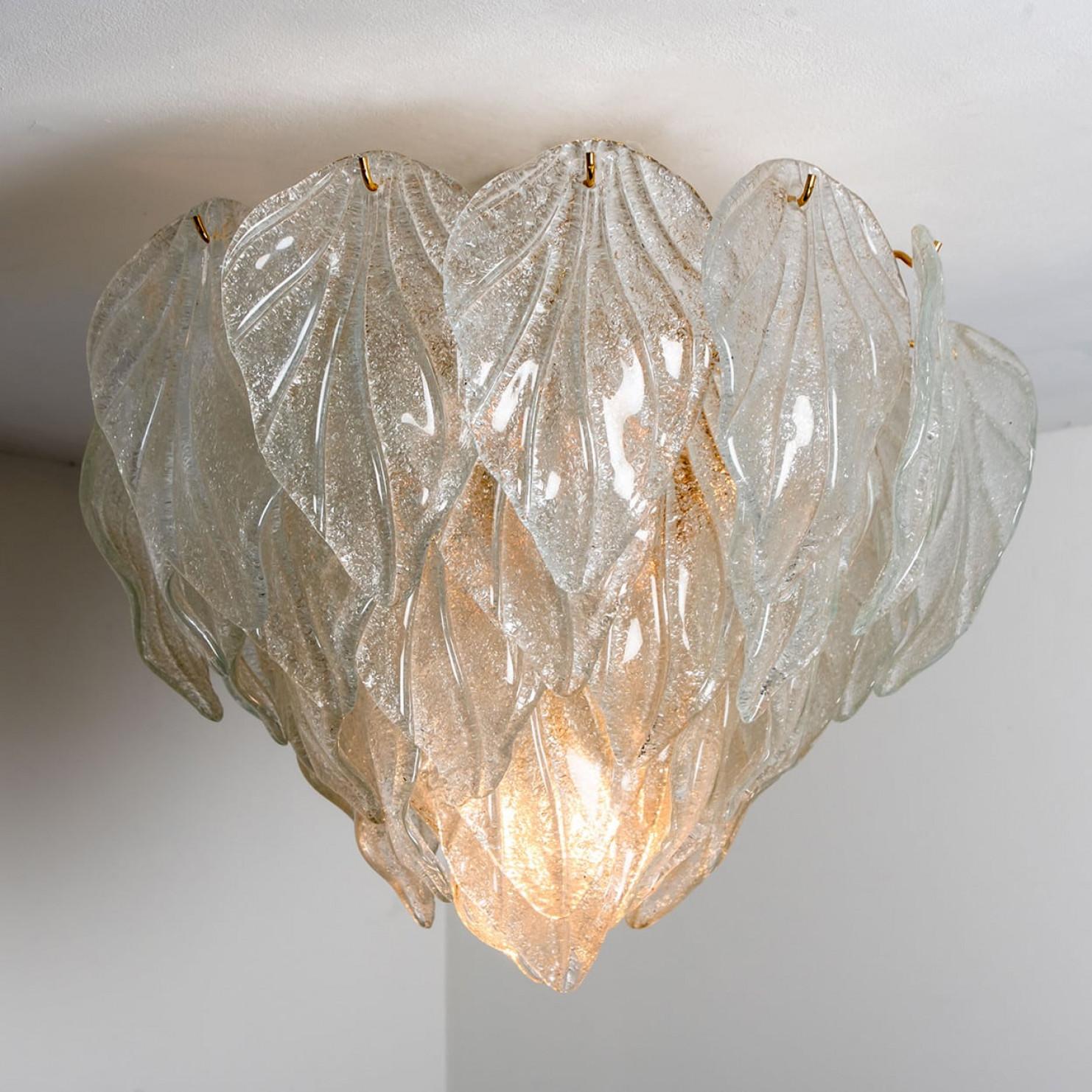 A Six-light Murano chandelier with layers of leaf form hand blown hanging glass with brass frame.

Cleaned well wired and ready to use. The chandelier requires 6 X E27 light bulbs up to 40 watt.

The chandelier can also be converted to flush