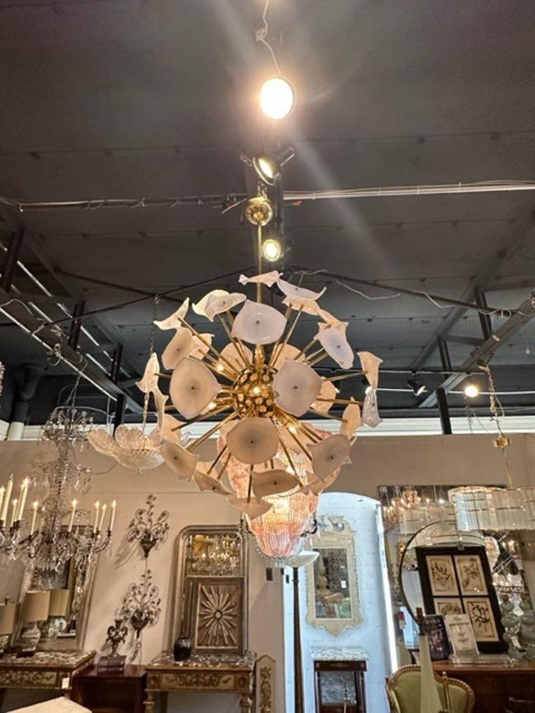 Modern Murano glass and brass Sputnik chandelier. circa 2000. The chandelier has been professionally rewired, comes with matching chain and canopy. It is ready to hang!