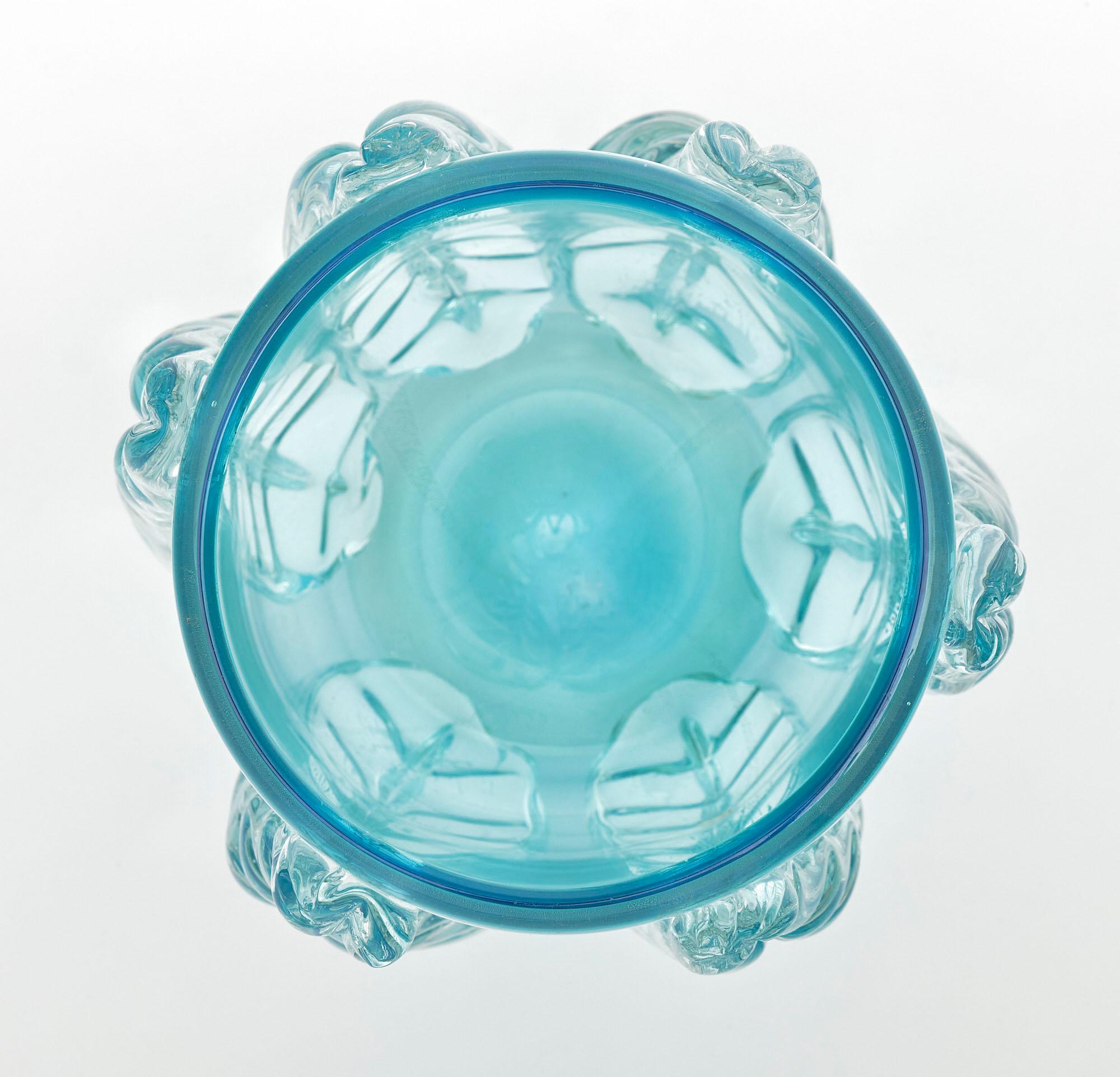 Vase from the island of Murano made of hand-blown aqua glass. This important piece has stylized acanthus leaves and a striking presence!