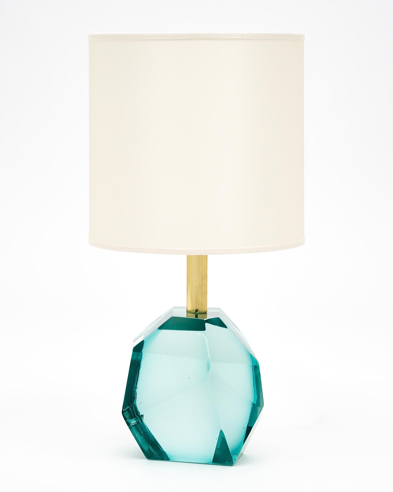 Murano glass aquamarine rock lamps signed by Alberto Dona. We love the modernity of the lamps, the abstract form, and the high decorative impact of this dynamic pair. They have been newly wired to fit US standards.