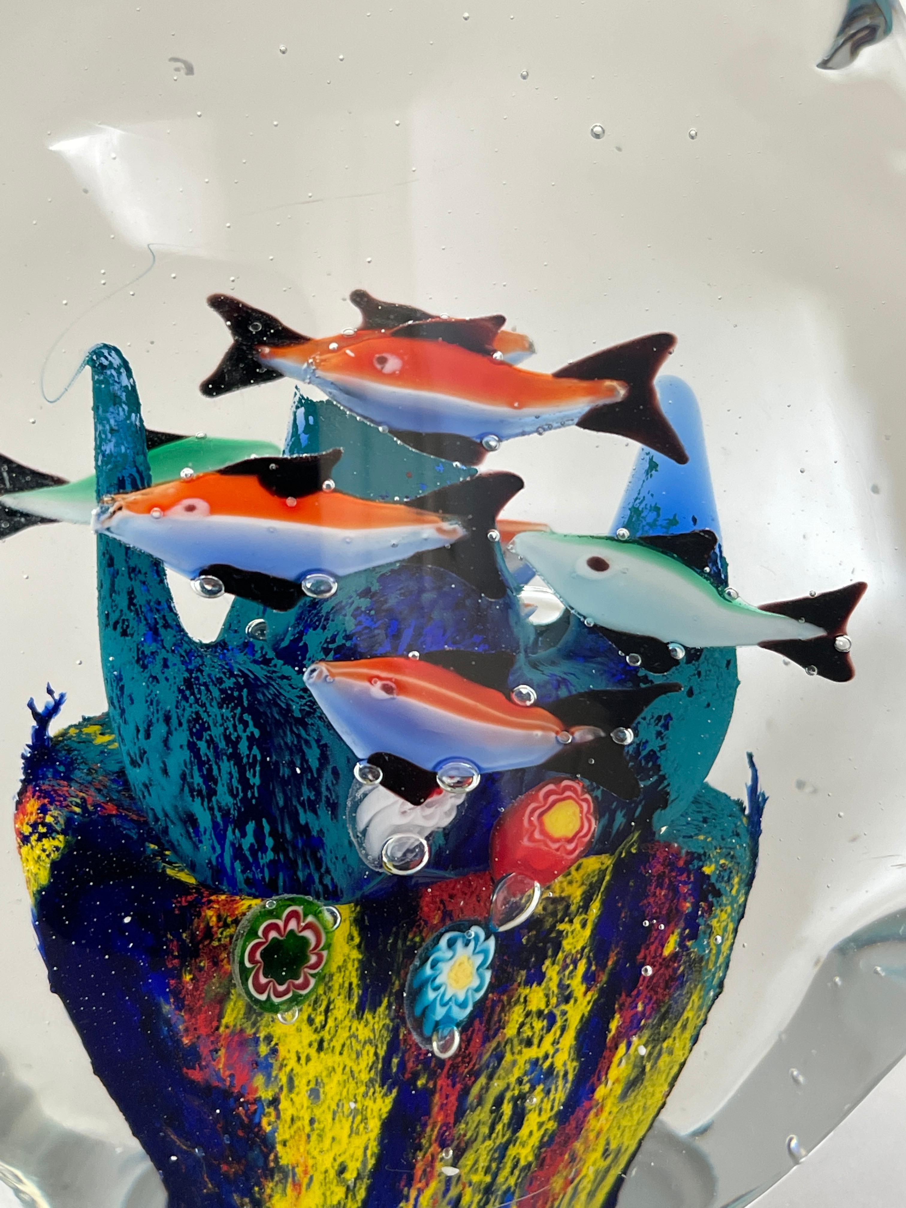 Italian hand blown solid glass aquarium with fish and sea life inclused into a clear blue curved wave shape sculpture. Murano, Italy c. 1970's-80's.
