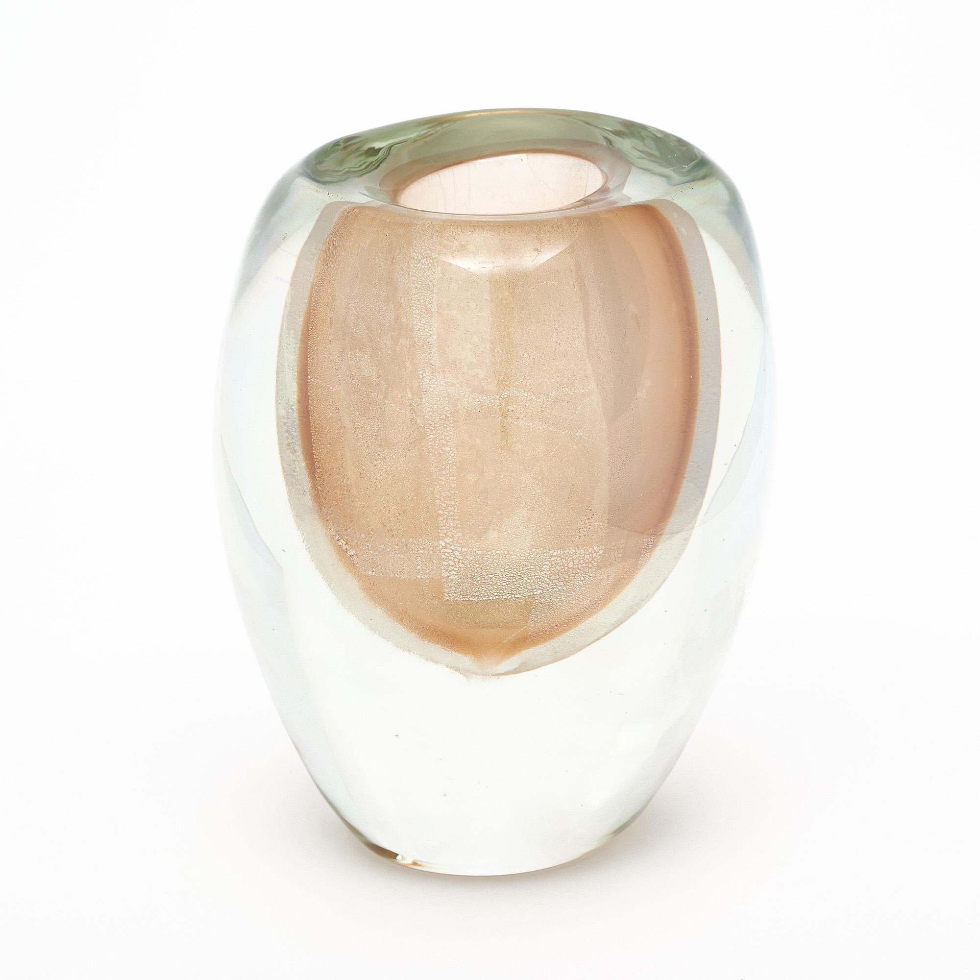Vase from Murano, Italy made of hand-blown glass using the sommerso and avventurina blowing techniques. 23 carat gold is fused within the glass in the avventurina process. Then the piece is blown using the sommerso technique which involves immersing