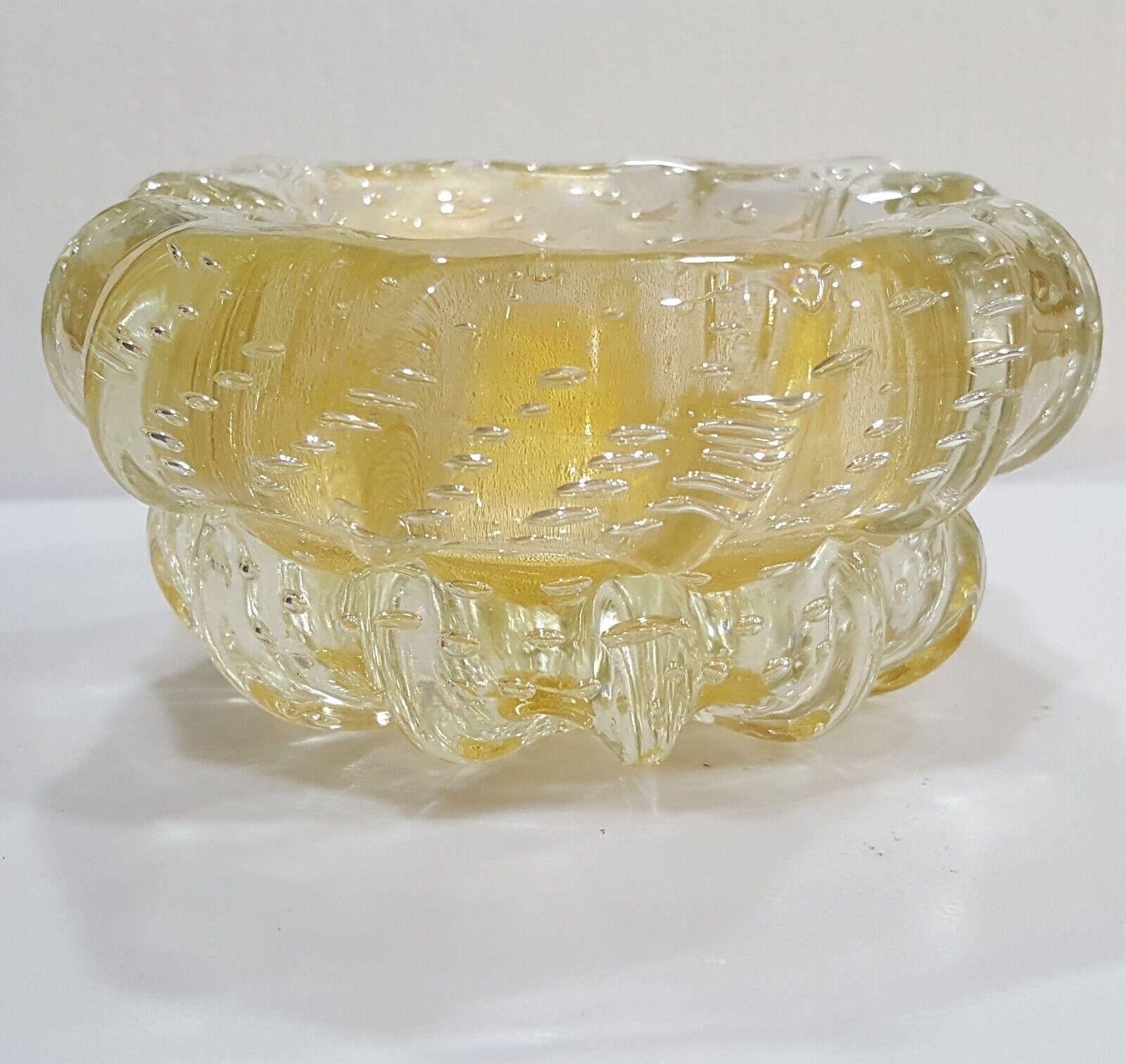 Murano Glass Barovier & Toso Gold Polveri & Bullicante Vintage Bowl/Ashtray/Dish. We found no chips or cracks. 
The base shows some wear (scratching and dulling). There are some small raised areas inside that can be felt -- probably a result of the