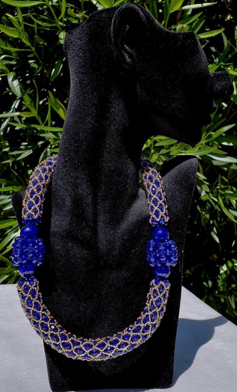 Cobalt Blue and gold multi strands Murano glass beads necklace.
Unique, handmade by artist Paola B. in Venise, Italy, 2010s.
Made of:  Murano glass beads and Miyuki gold beads.
Hypoallergenic Italian Silver 925 gold plated clasp.
Length: 21.65 in.