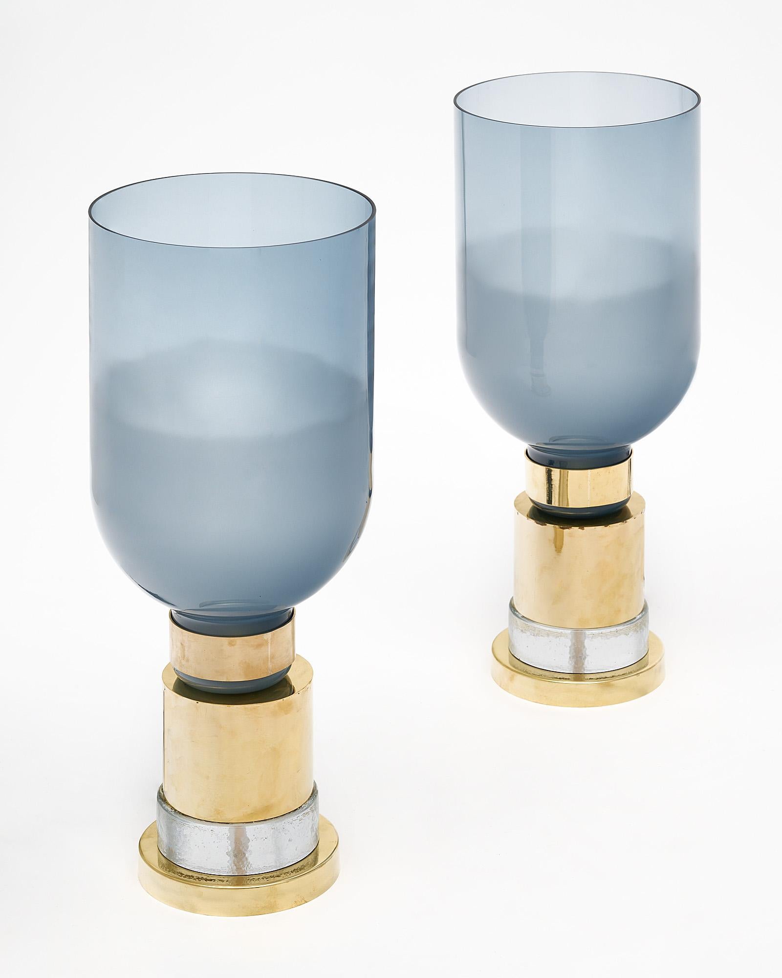 Pair of lamps from the island of Murano outside of Venice, Italy. This hand blown pair has a base made of brass and clear glass with a hand-blown blue and frosted glass shade. They have been newly wired to fit US standards.