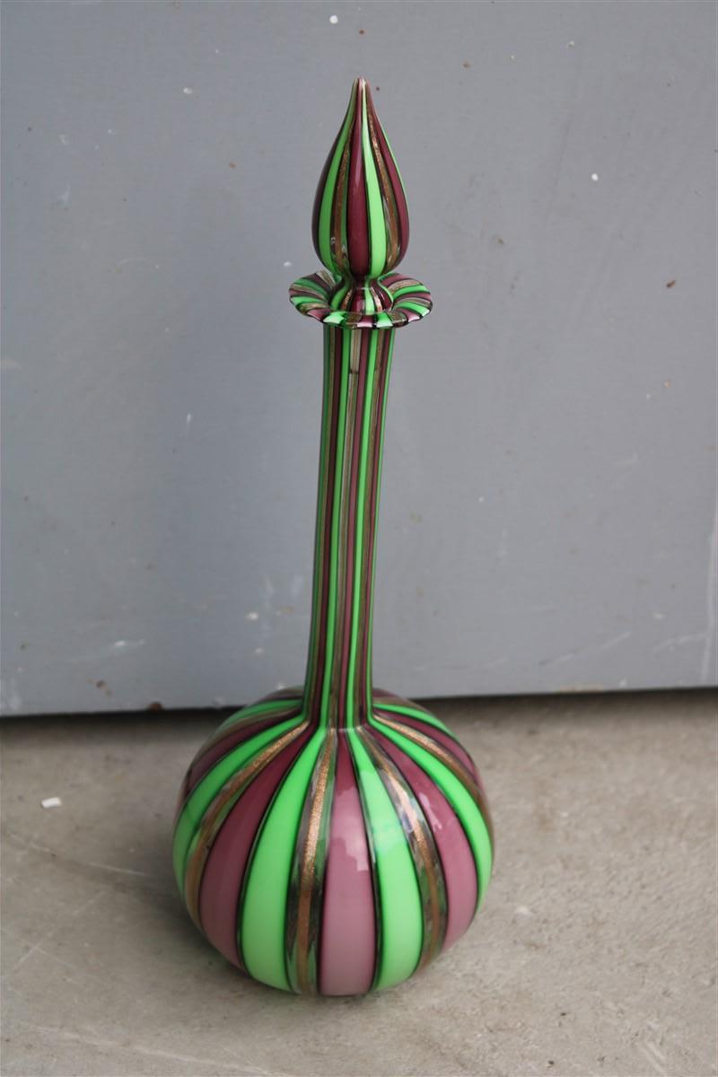 Murano glass bottle colored green and gold Italy 1970s.