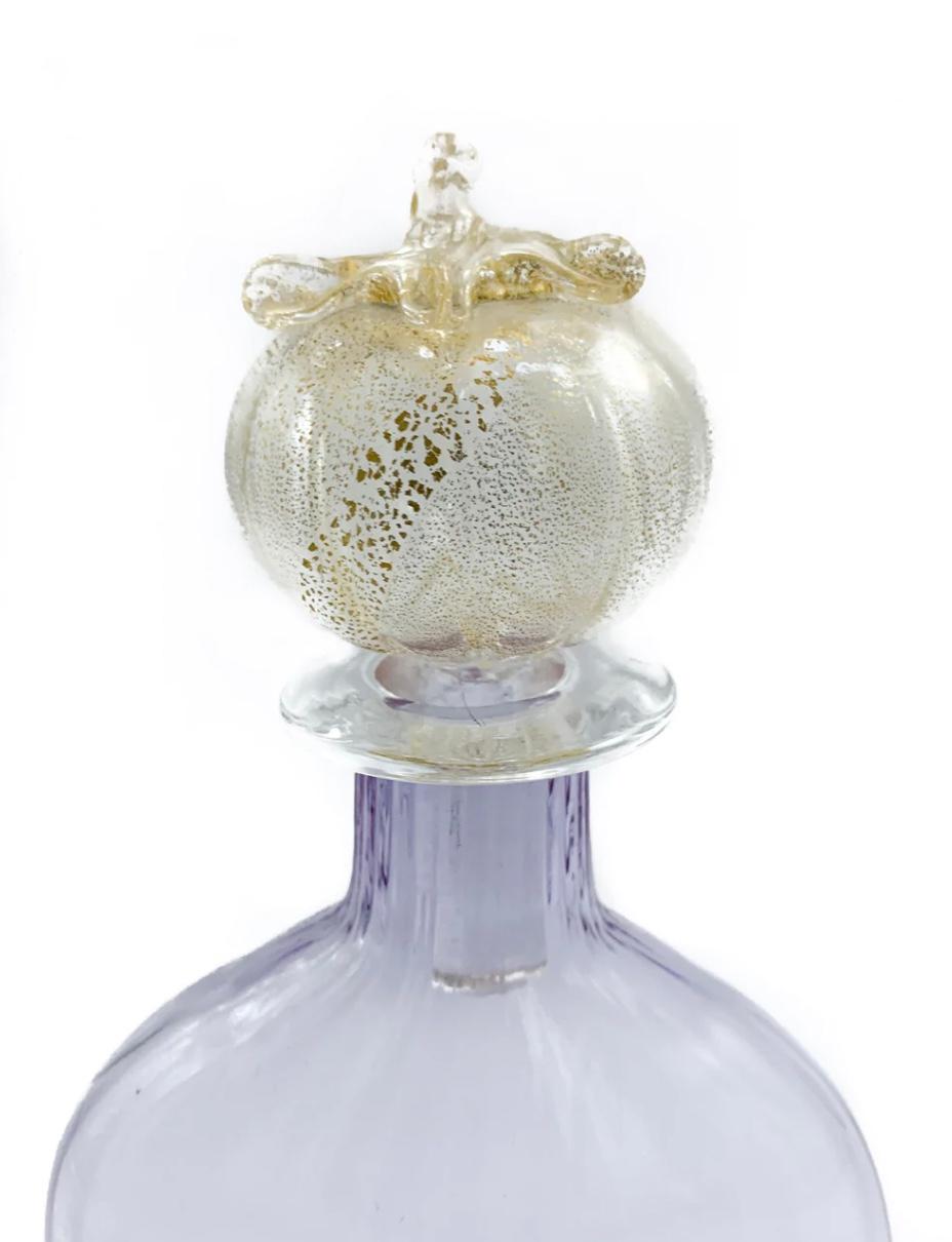 Hand blown Murano glass bottle by Carlo Moretti, 1970s

 Measures: Ø cm 12, H cm 25

Carlo Nason, born in Murano in 1935 from one of the oldest glassmaking families on the island, he was a great master glassmaker. He grew up attending the glass