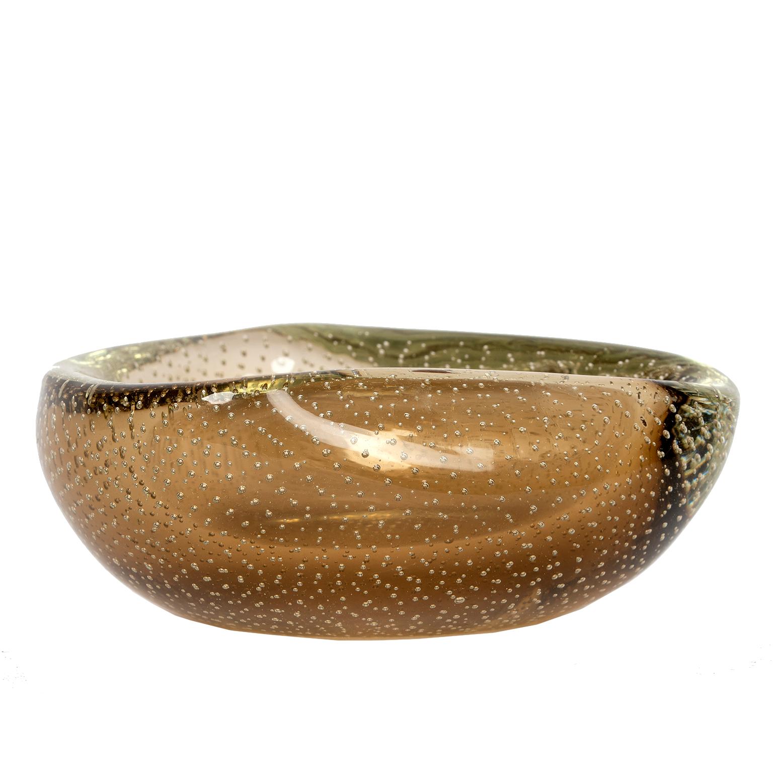A sophisticated modernist Murano bowl with smoked amber tones and bubble inclusions.